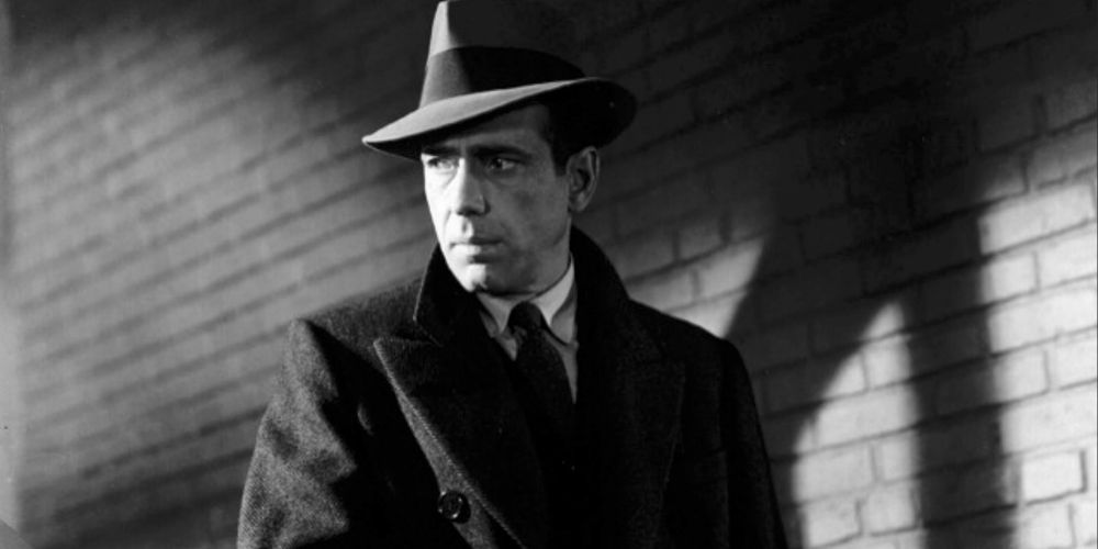 A dramatic shot of Sam Spade in black and white.