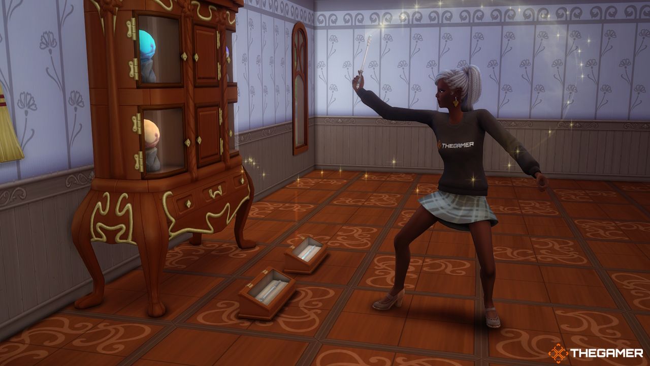 A Sim performs spells on their magical artifacts