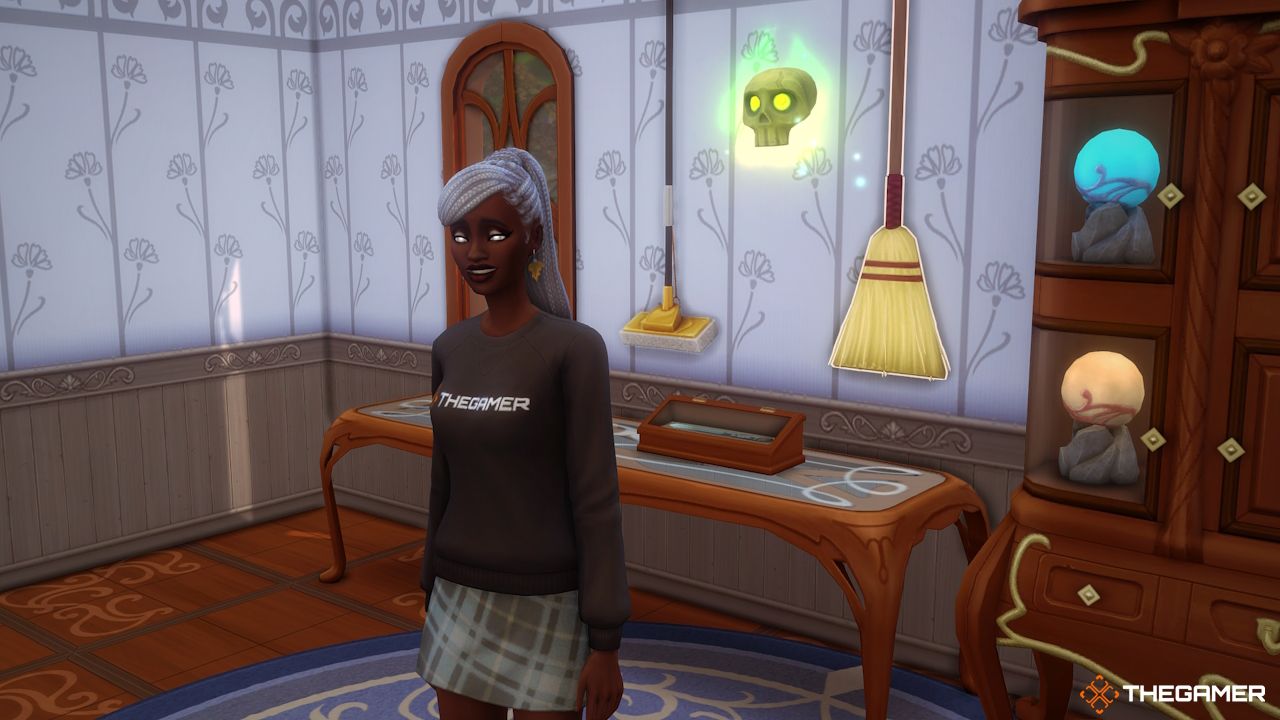 A Sim with their floating green skull familiar