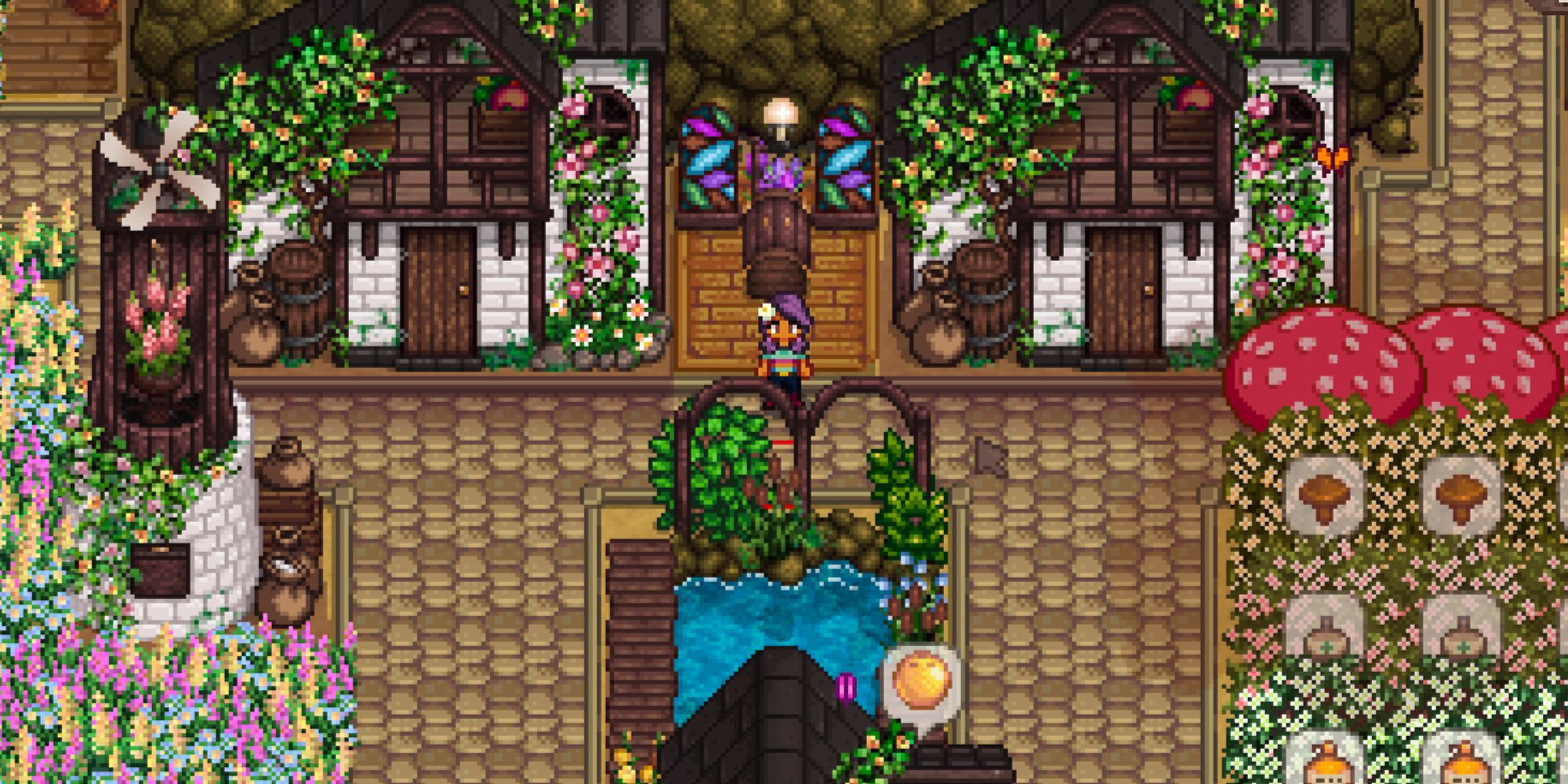 Stardew Valley farmer standing between two sheds and behind a fish pond on the Four Corners farm.
