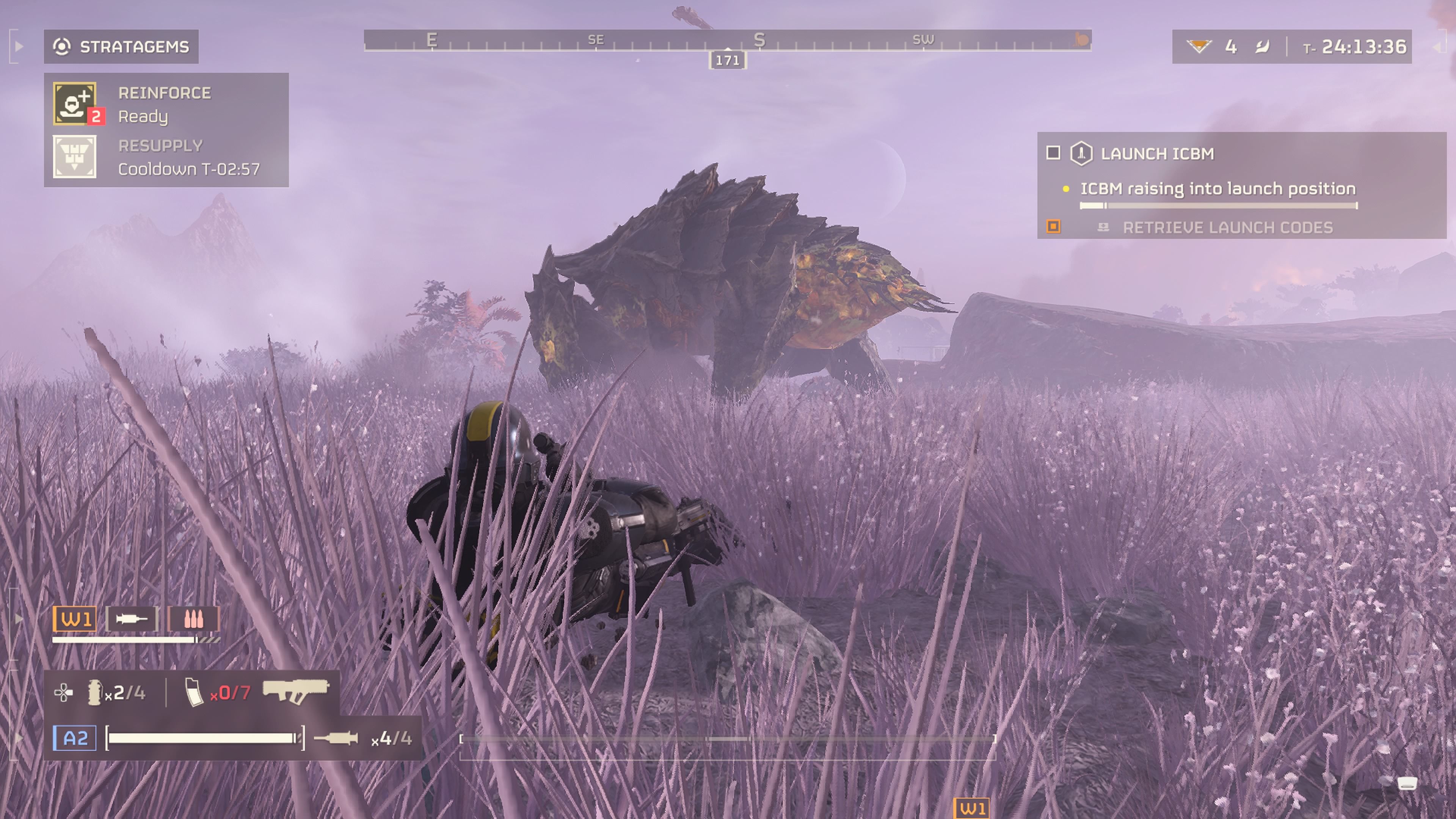 Player character laying prone and aiming at a Charger that's going after another player in Helldivers 2.