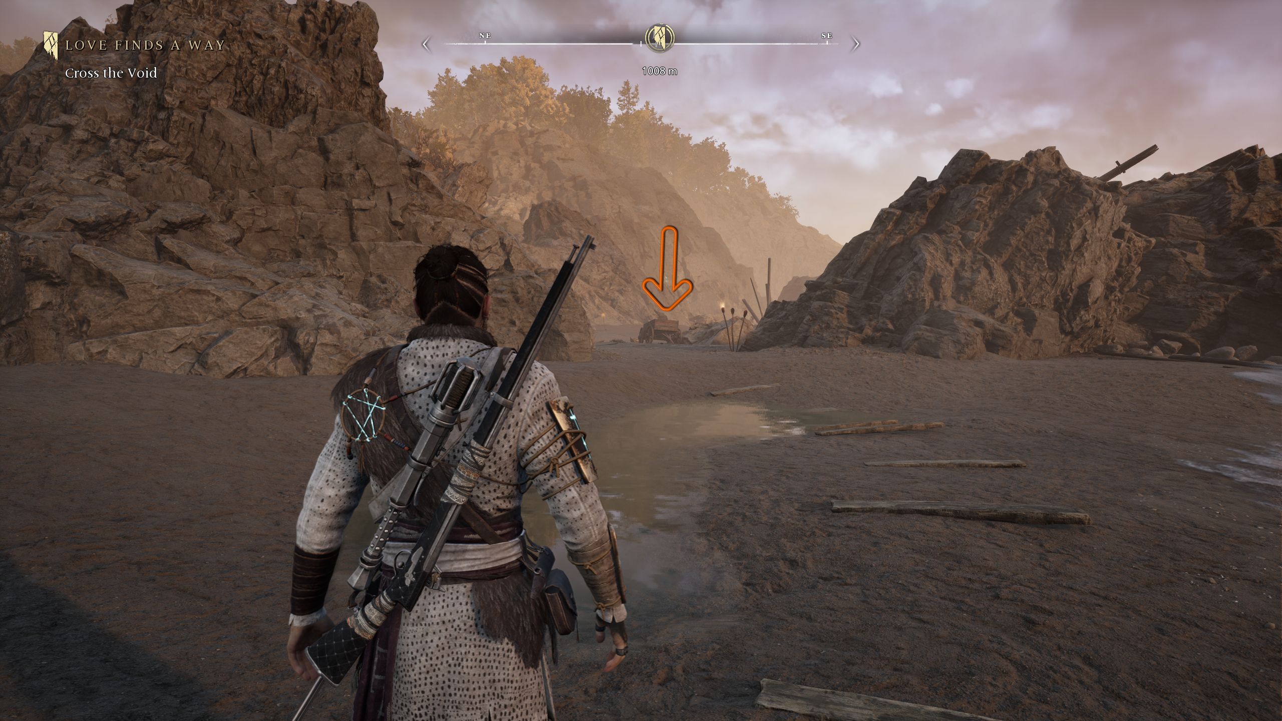 An arrow showing the location of the key to The Atherton's Cache Chest - Banishers Ghosts of New Eden