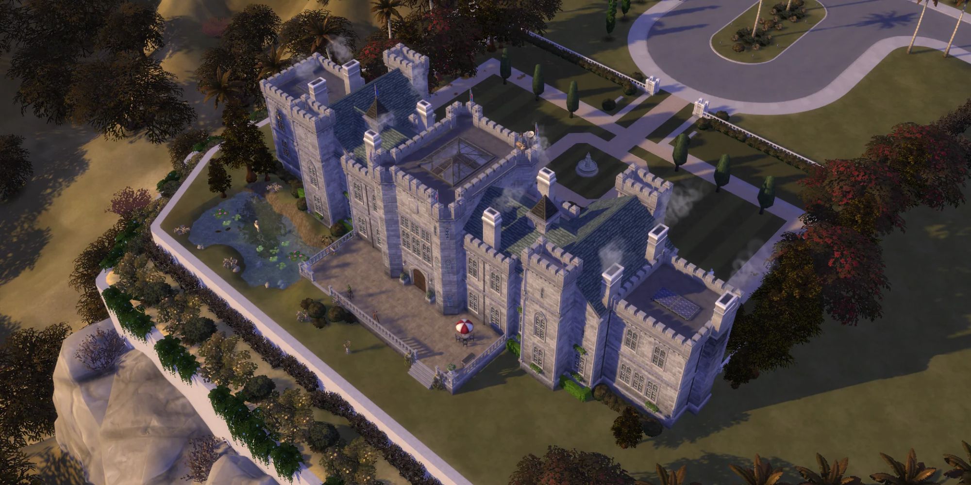 An image from The Sims 4 of a Castle built with the Castle Estate Kit. This Castle utilizes new freezes and fences to make the build truly stand out.