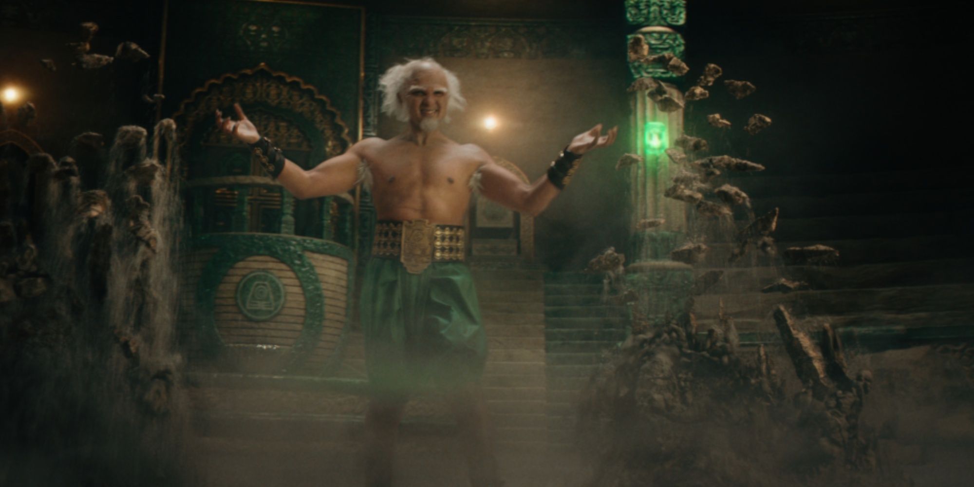 bumi-earthbending in the arena with Aang, raising his hands with two rough pillars next to him