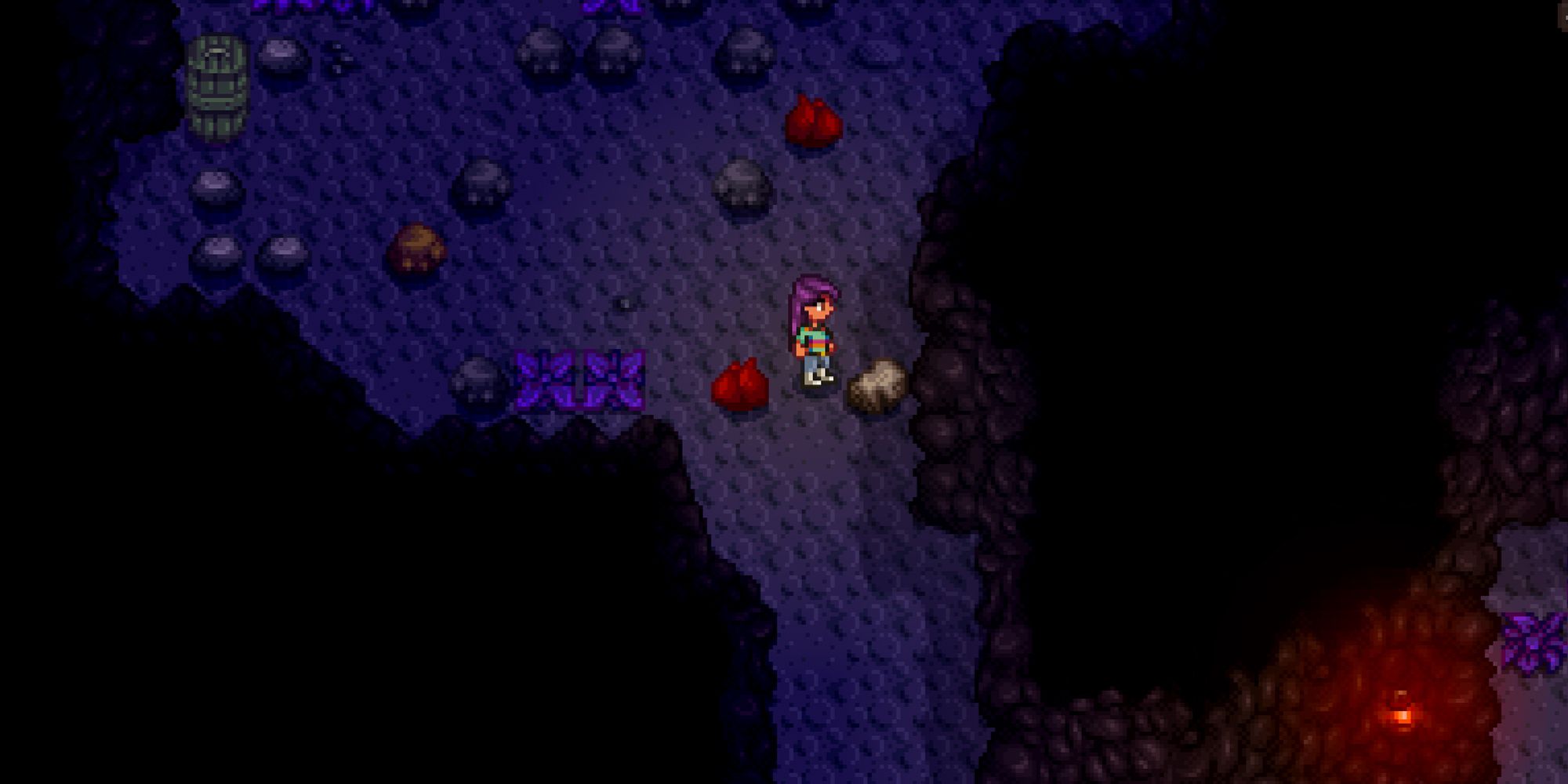 Farmer standing next to a silver rock in Stardew Valley mine