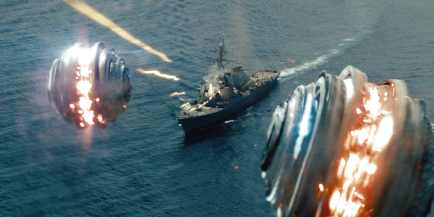 Image of Battleship in the water, firing at Alien projectiles from the movie Battleship.