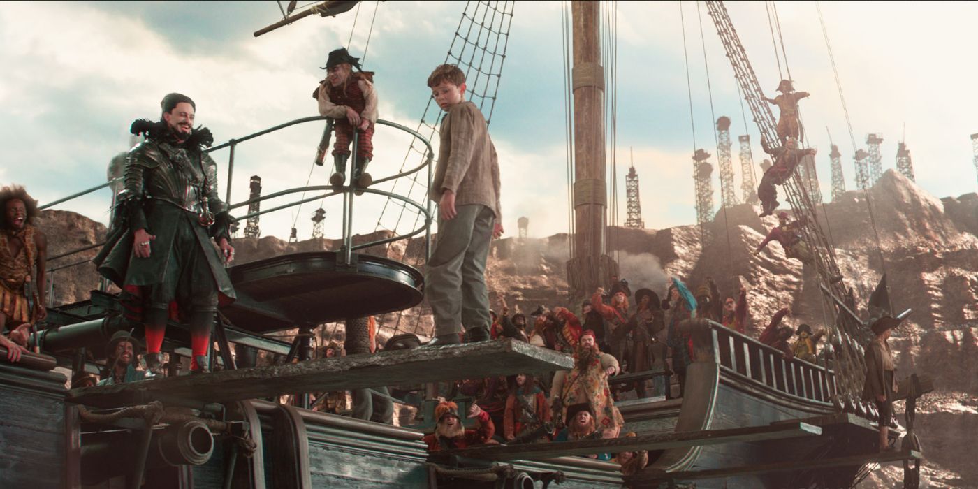 image of many characters from the movie Pan hanging out on a Pirate ship from the movie Pan.