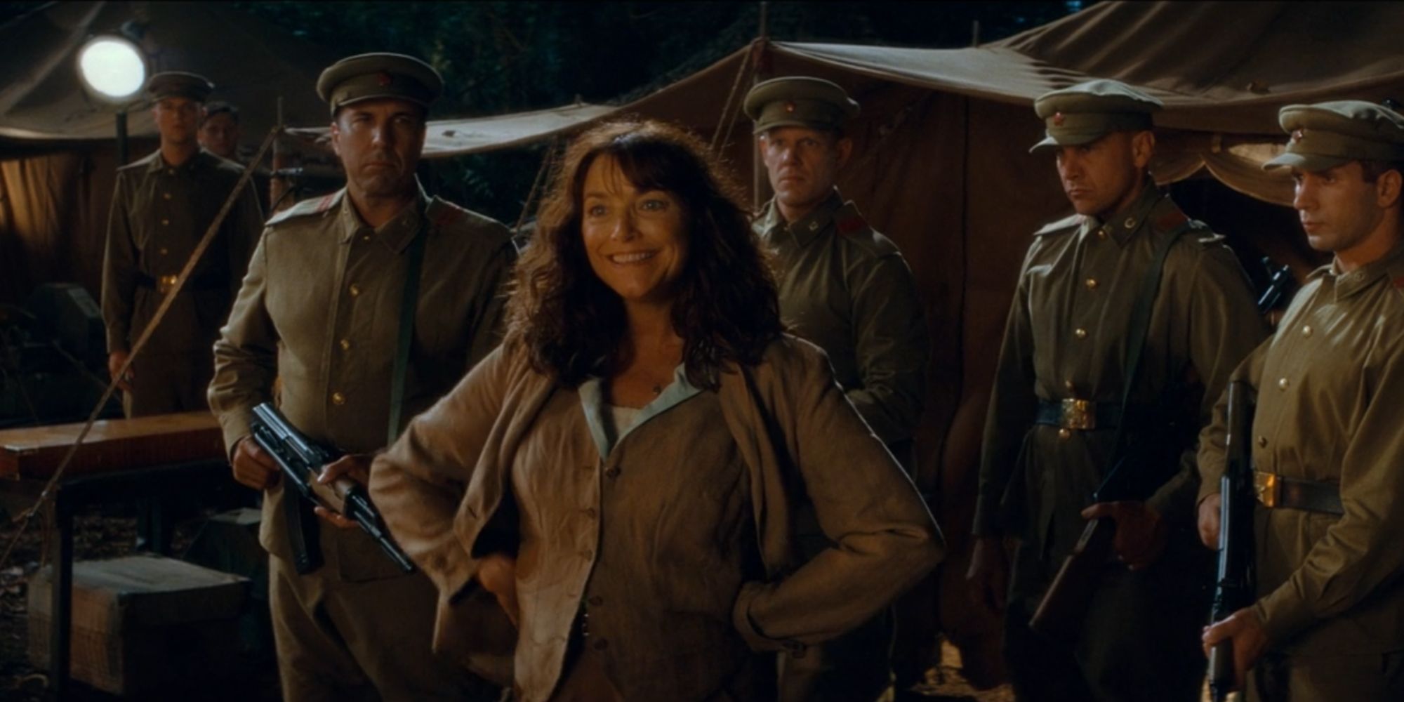 Indiana Jones and the Crystal Skull Marion stands with her hands on her hips at night