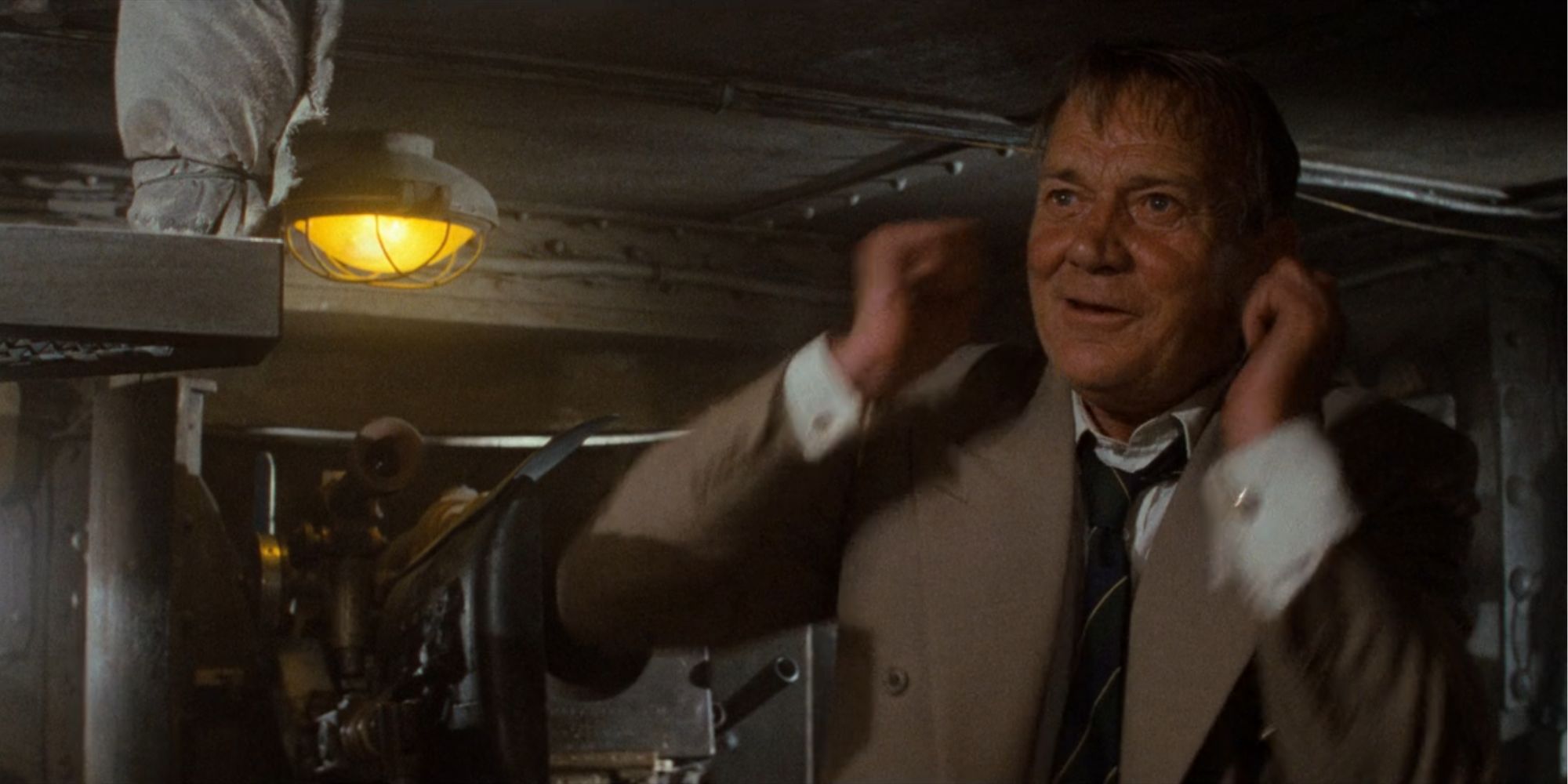 Indiana Jones and the Last Crusade Marcus Brody pulls on his ears in a tank