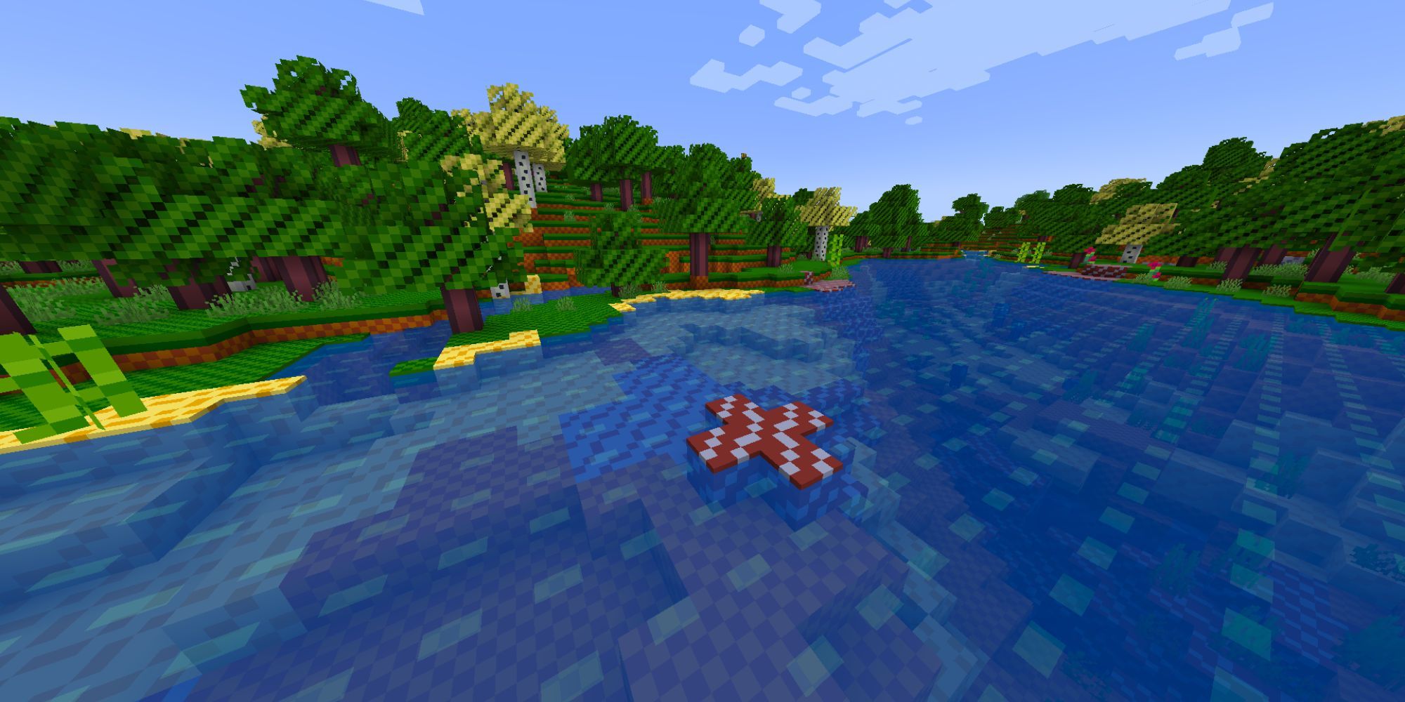 A cute, 4x4 scene showing sand, gravel, dirt, trees, grass, and a river.
