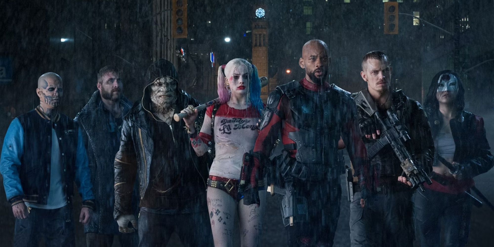 Diablo, Captain Boomerang, Killer Croc, Harley Quinn, Deadshot, Rick Flag, and Katana walking in the rain.