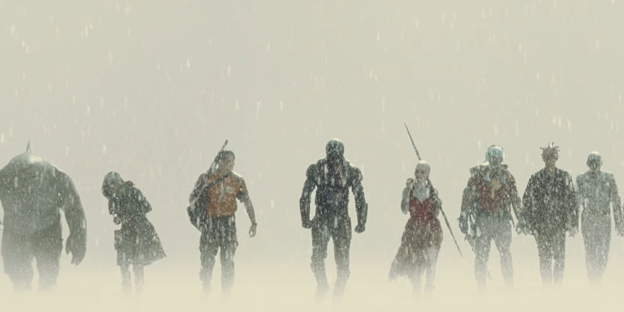 King Shark, Ratcatcher 2, Rick Flag, Bloodspot, Harley Quinn, Peacemaker, Thinker, and Polka-Dot Man walking in the rain.