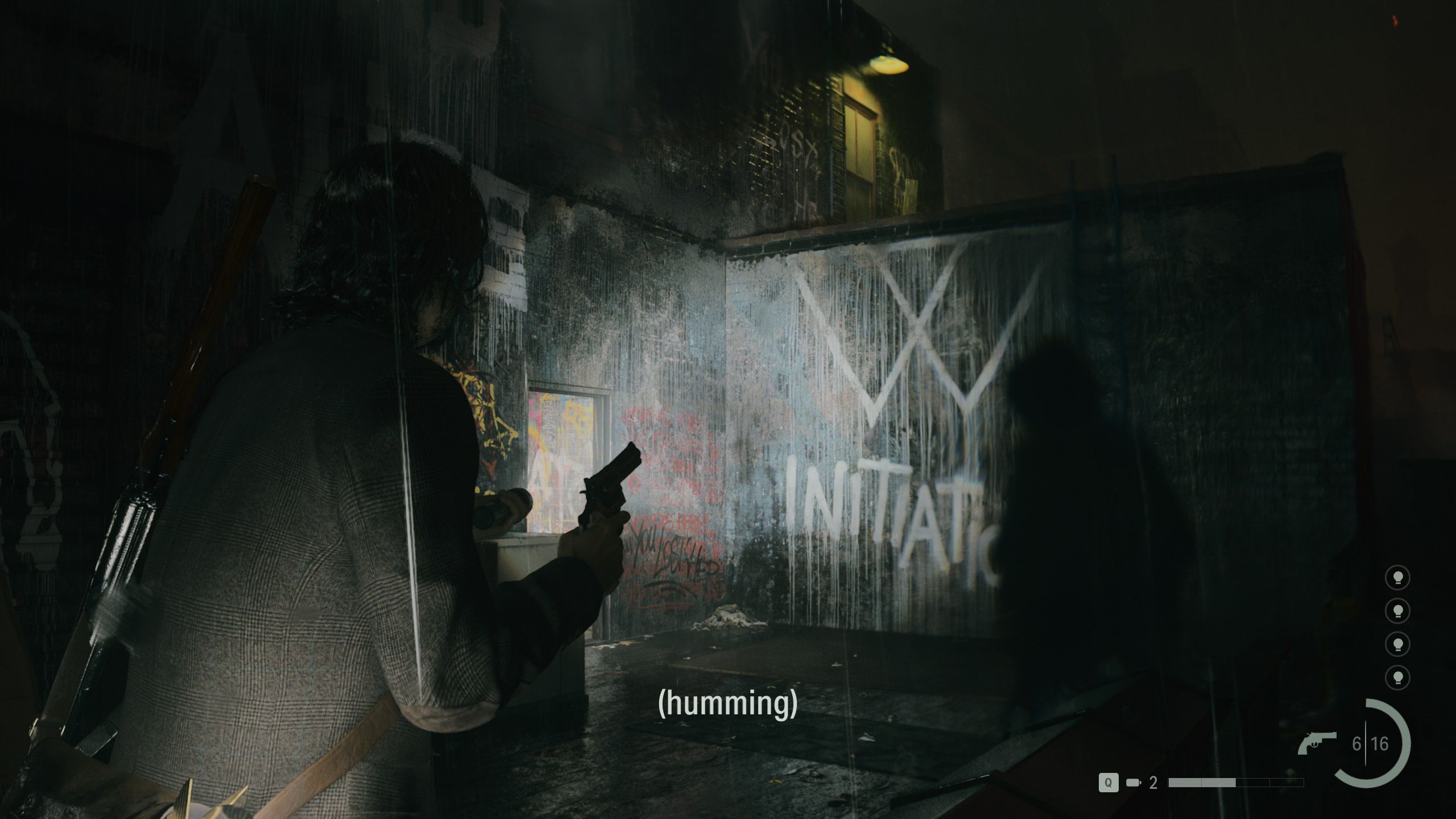 Alan shines a light on a graffiti'd wall. On his left, a Break Room, well lit. A little to the right, a wall with a ladder. A shadowy figure approaches.