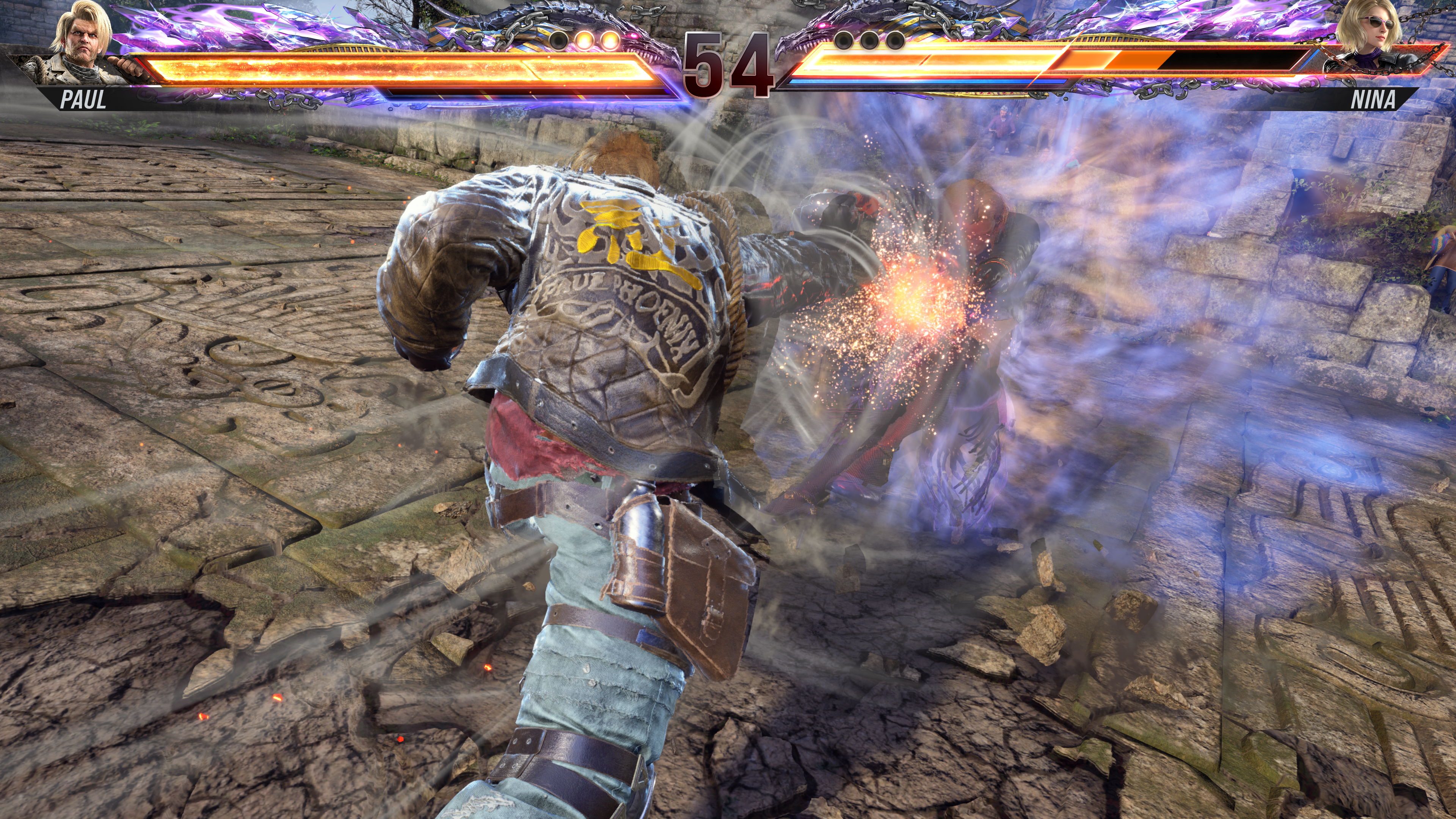 Paul executing his Heat Smash on Nina in Tekken 8