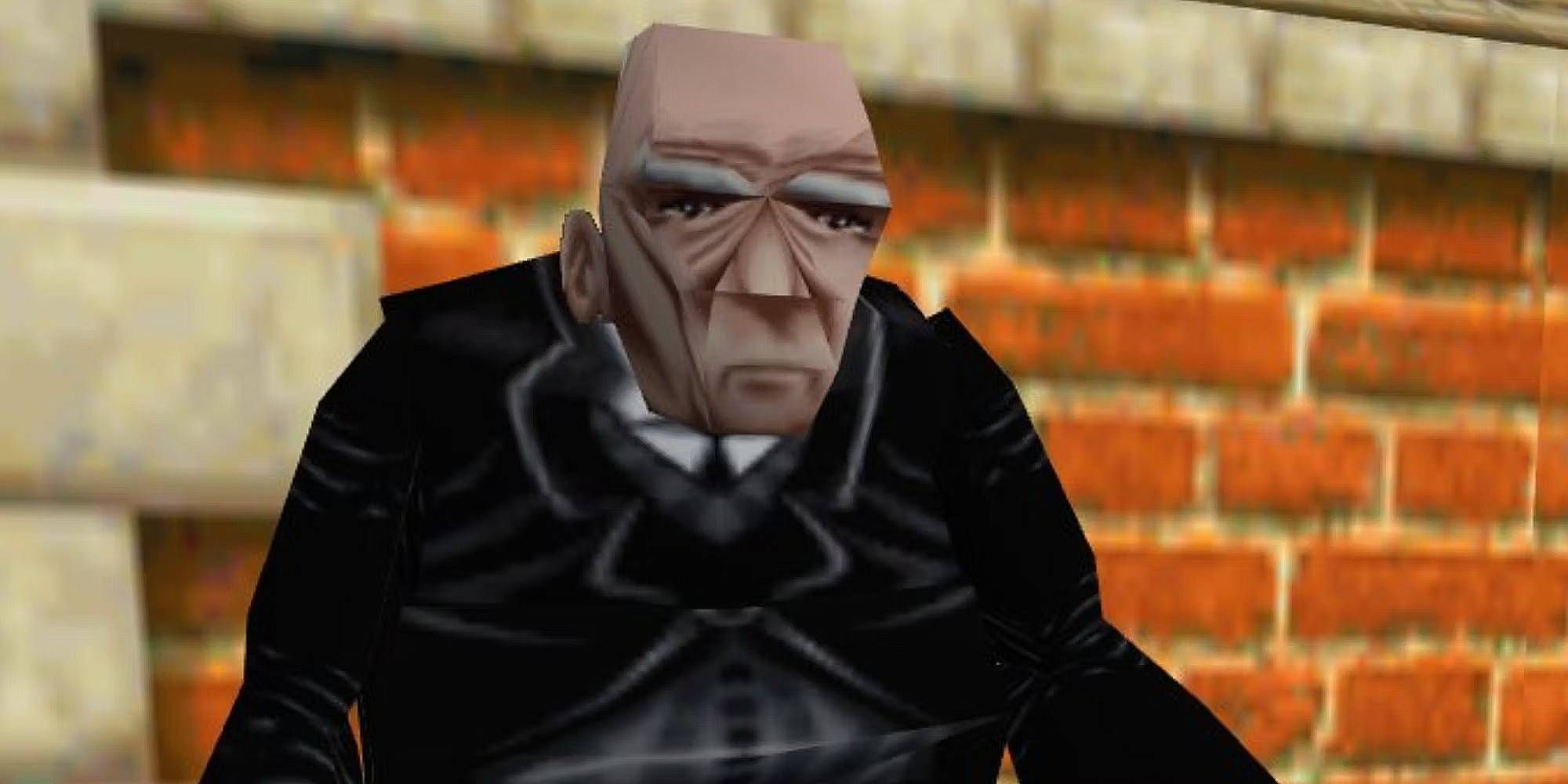 Winston the butler from Tomb Raider 1-3 Remastered standing by a wall
