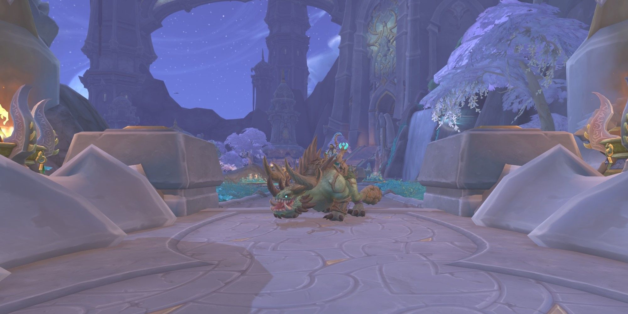 A Verdant Armoredon mount at the entrance of Valdrakken with an orc sitting atop