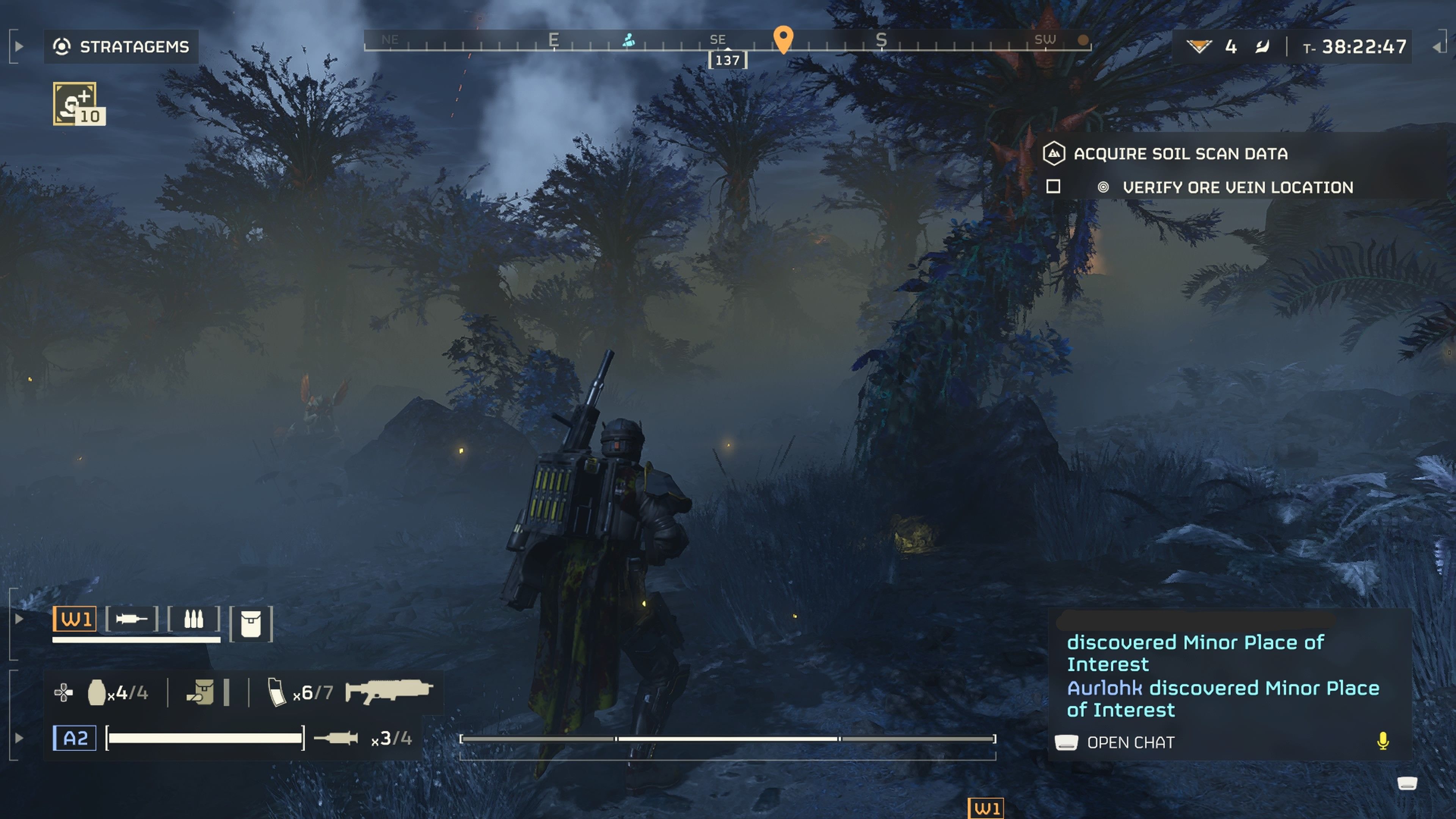 Player character standing at the edge of a yellow-gray Spore Spewer cloud in an alien forest in Helldivers 2.