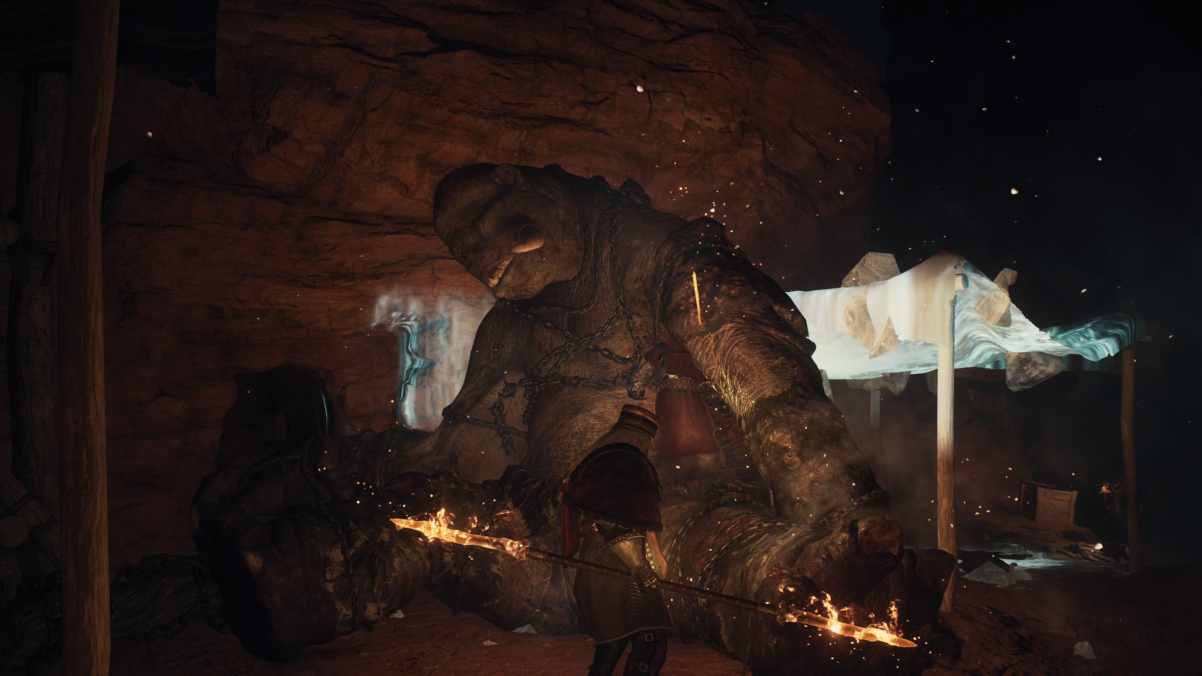 Player Arisen standing in front of a Cyclops that they've knocked down against a wall during battle in Dragon's Dogma 2.