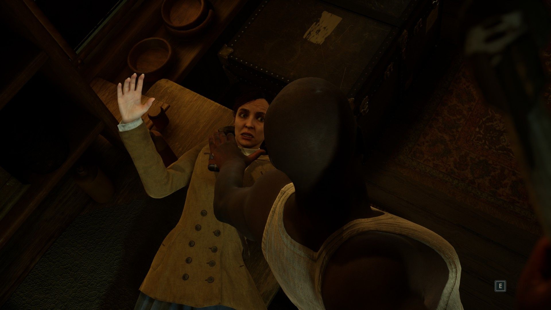 Emily being choked by man in Alone in the Dark.