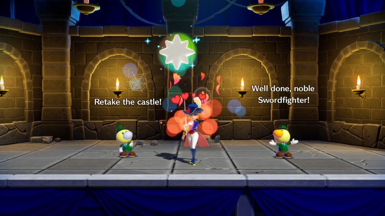 Princess Peach Showtime Peach surrounded by hearts after winning a battle