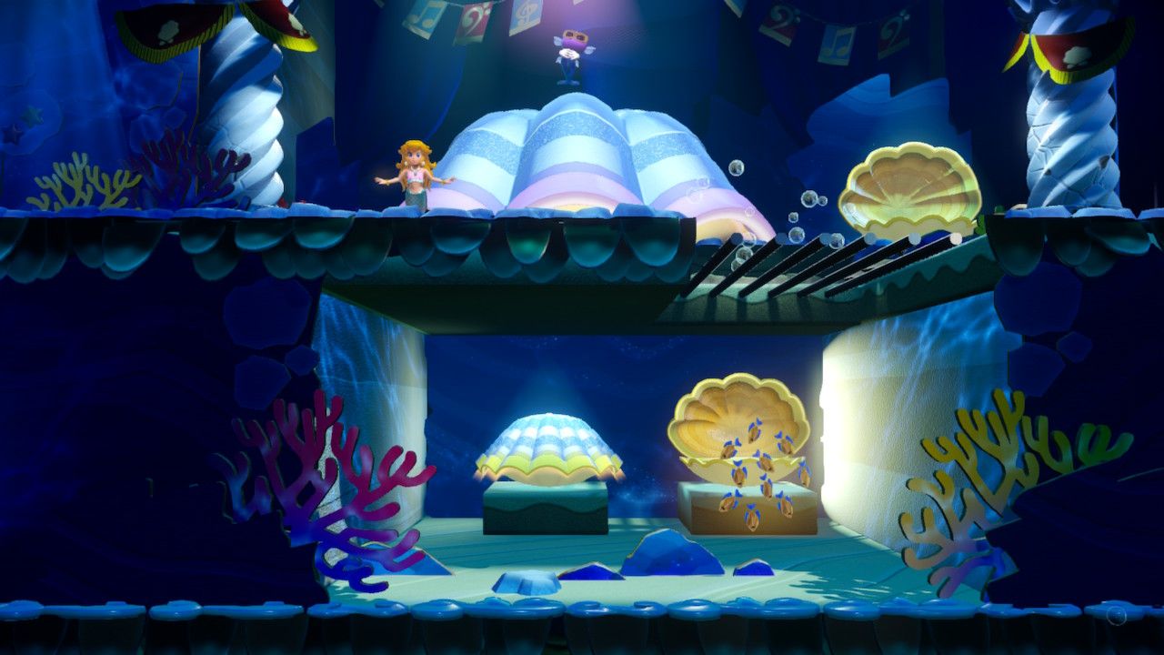 Princess Peach Showtime Peach next to a giant clamshell