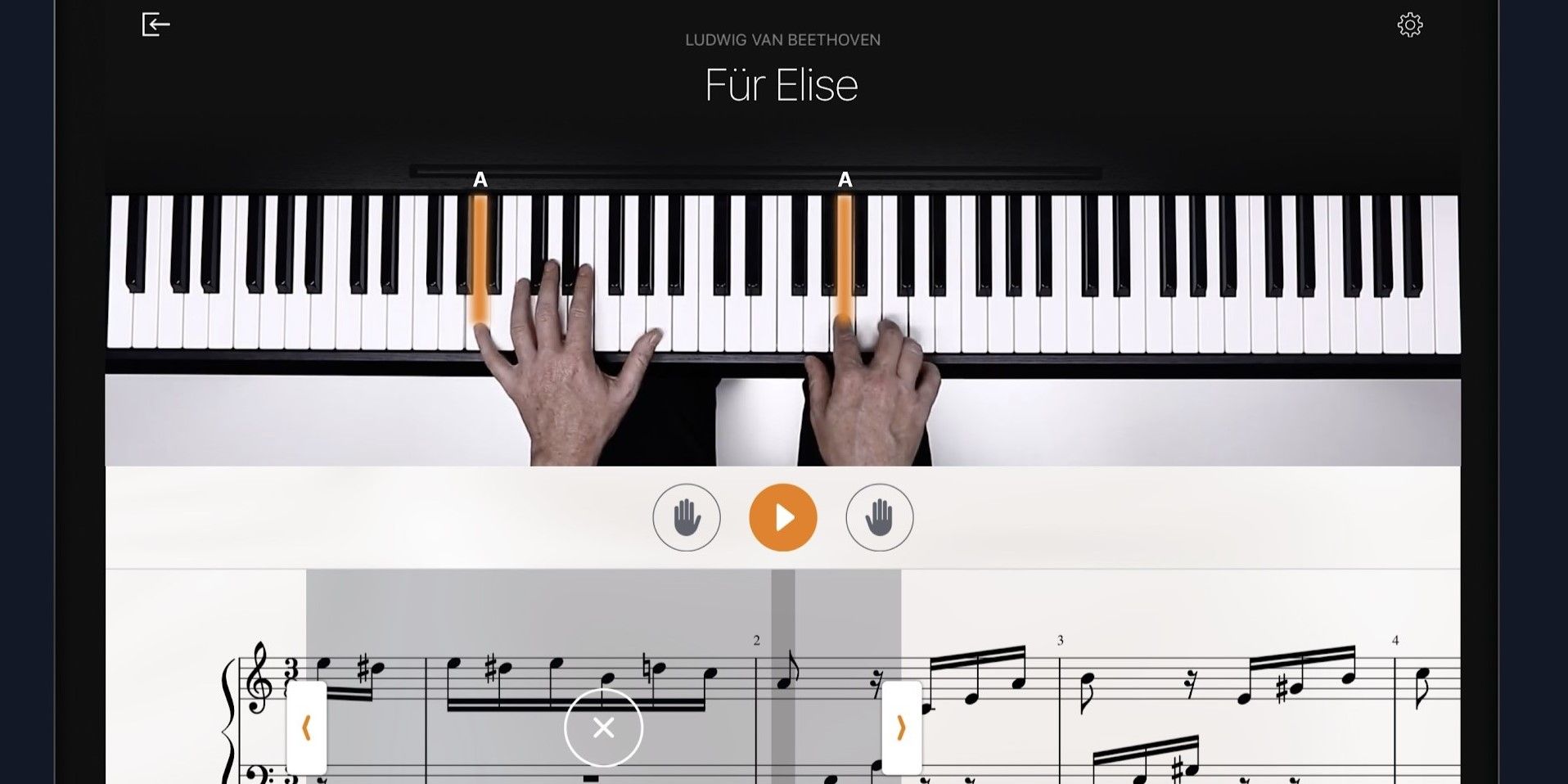 A person using Flowkey while playing the piano-1