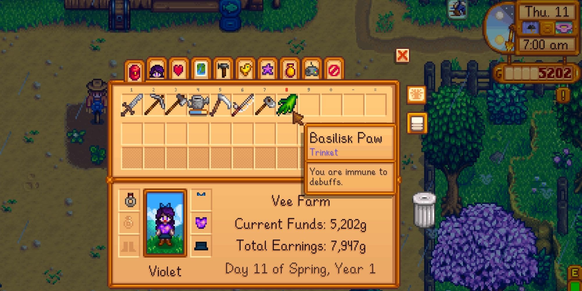 The Basilisk Paw trinket in the player's inventory in Stardew Valley.