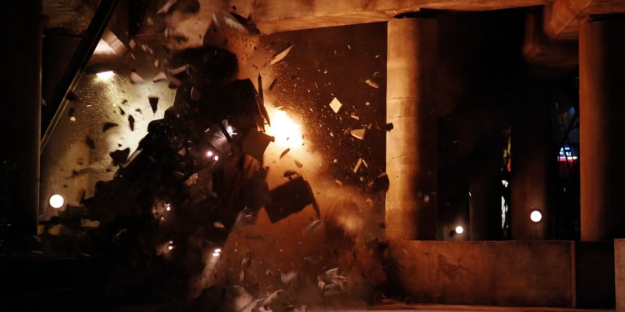 The Dark Knight: The Batmobile Crashes Through Several Cement Barricades