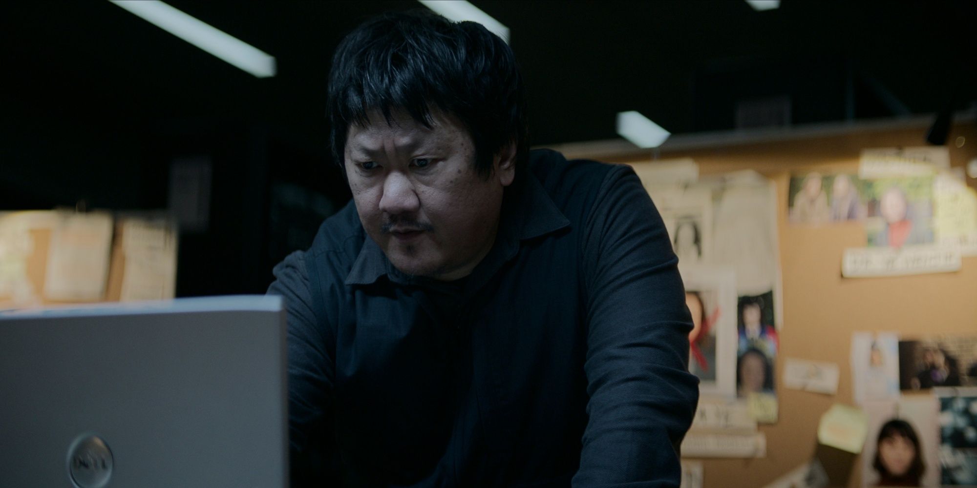 Benedict Wong looks at a laptop as Da Shi in 3 Body Problem