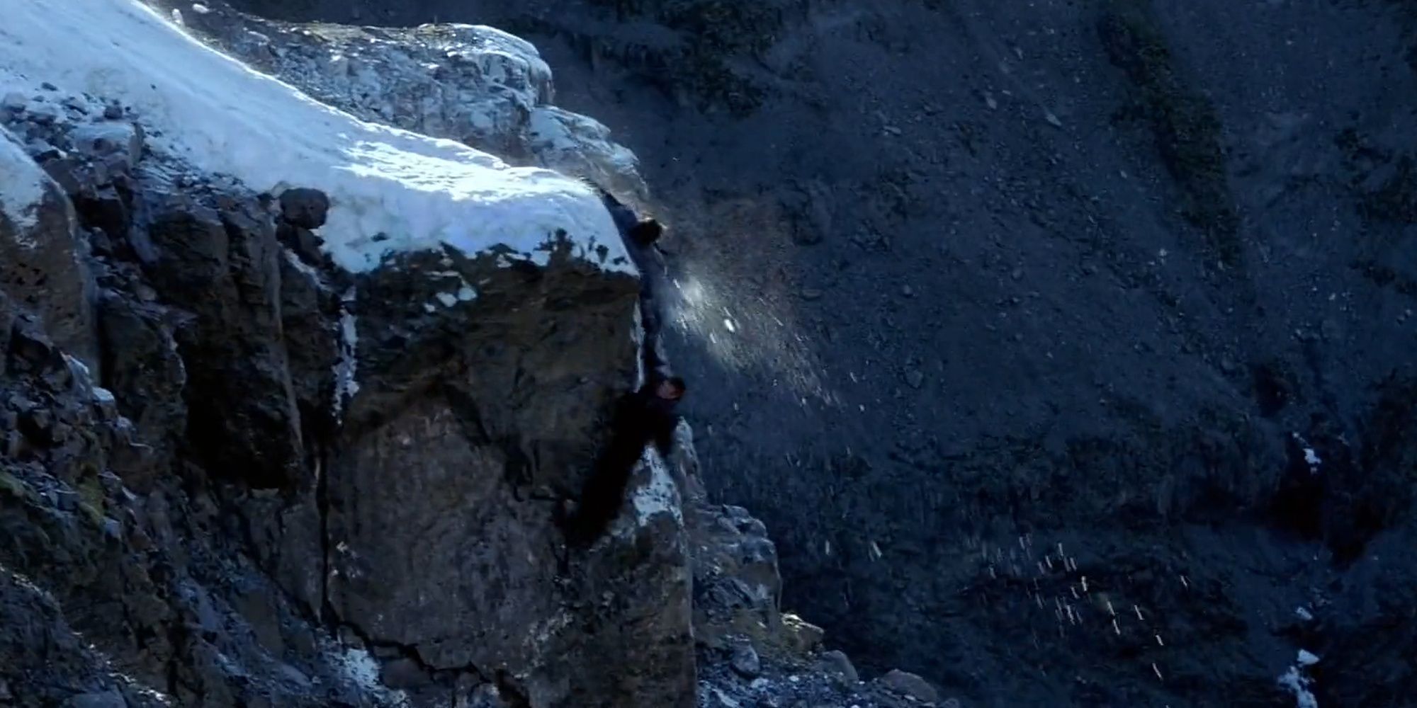 Batman Begins: Bruce And Ra's Hanging From A Cliff