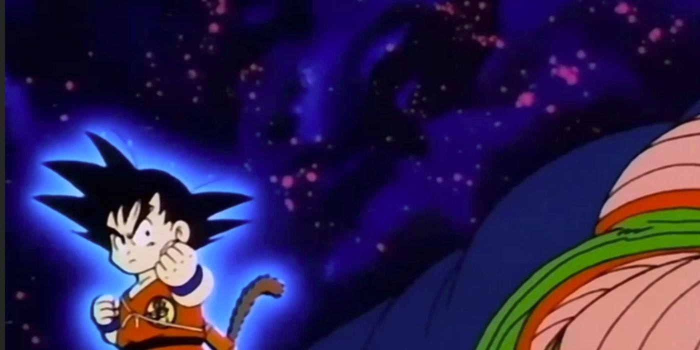 Goku powers up to fight King Piccolo, whose arm can be seen. 