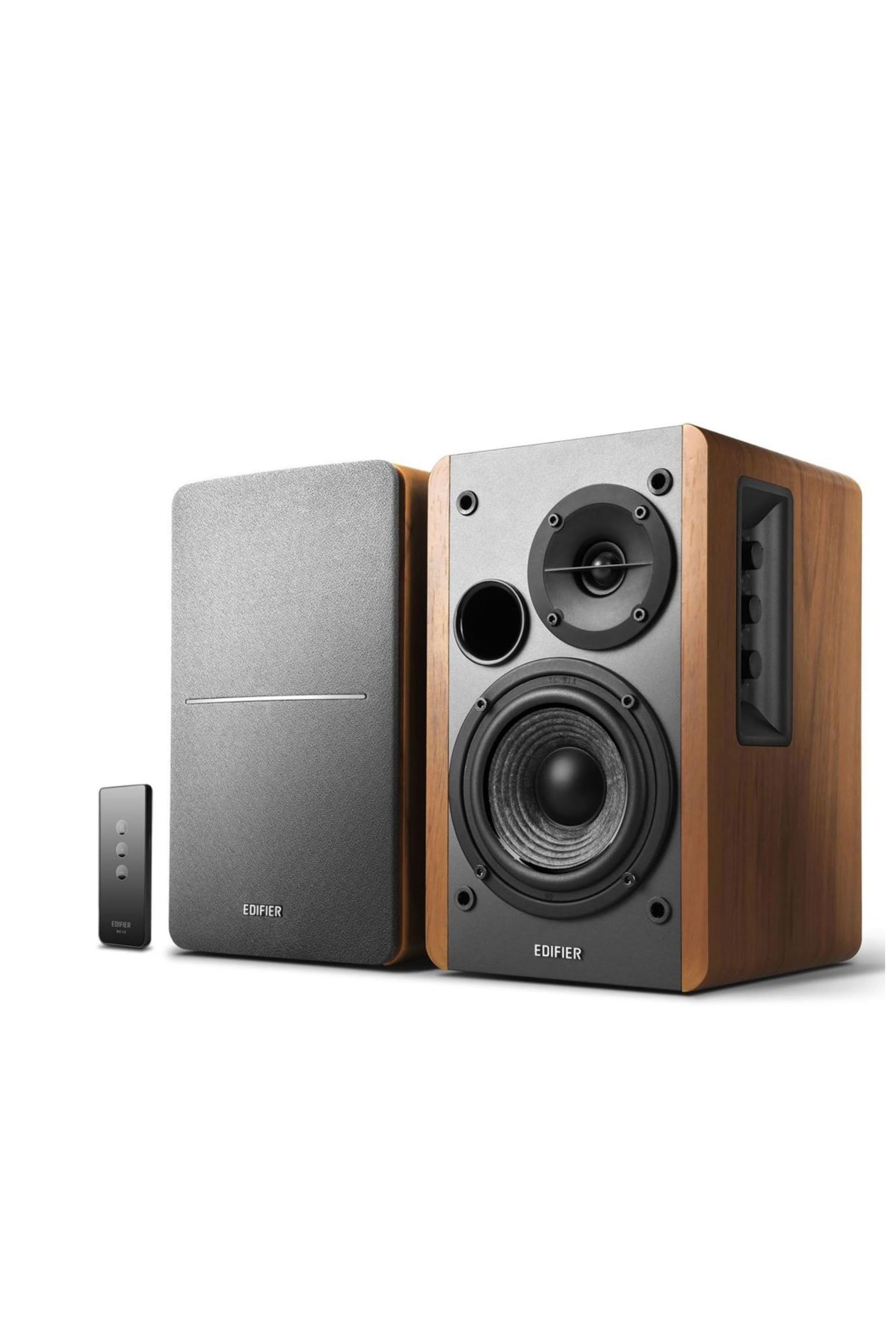 An Edifier R1280T against a white background in a rustic brown wooden housing.
