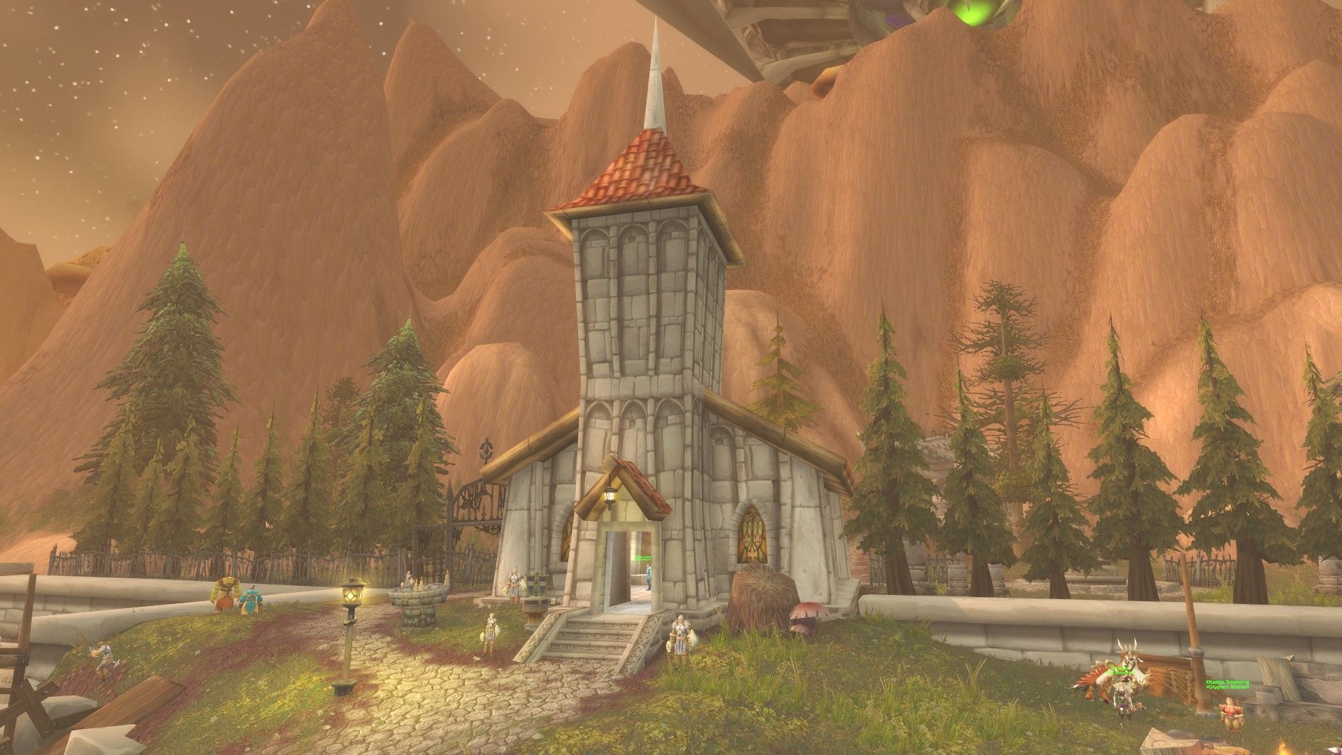 Light's Hope Chapel, flanked by several pinetrees and surrounded by its defenders and inhabitants