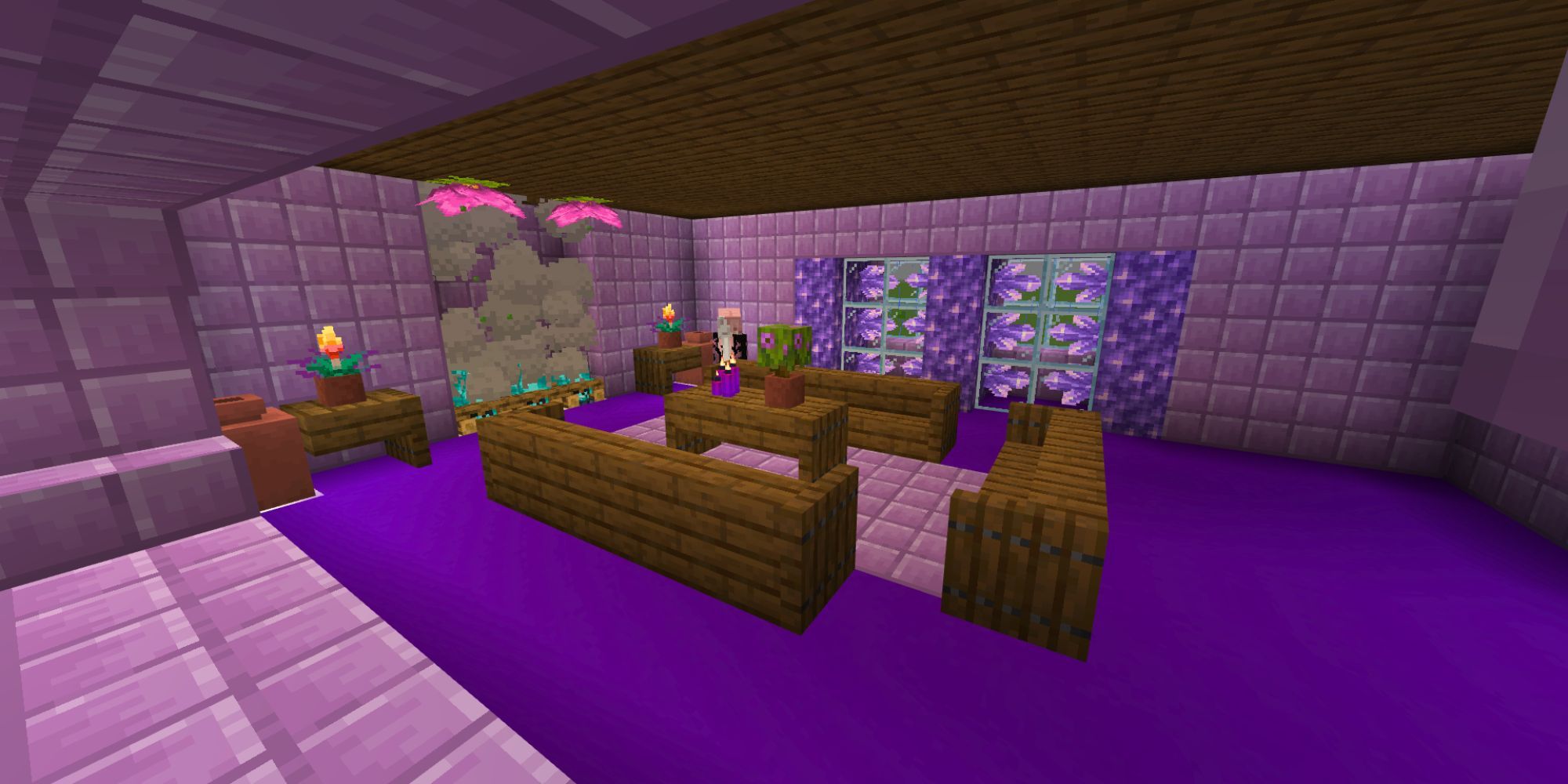A largely pink and purple room with spruce wood furniture, amethyst crystals, and a fireplace.