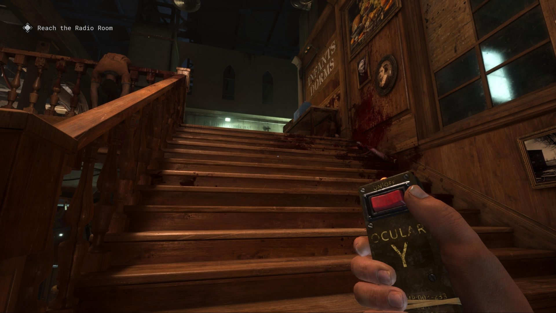 Going up the stairs in the Orphanage in The Outlast Trials.