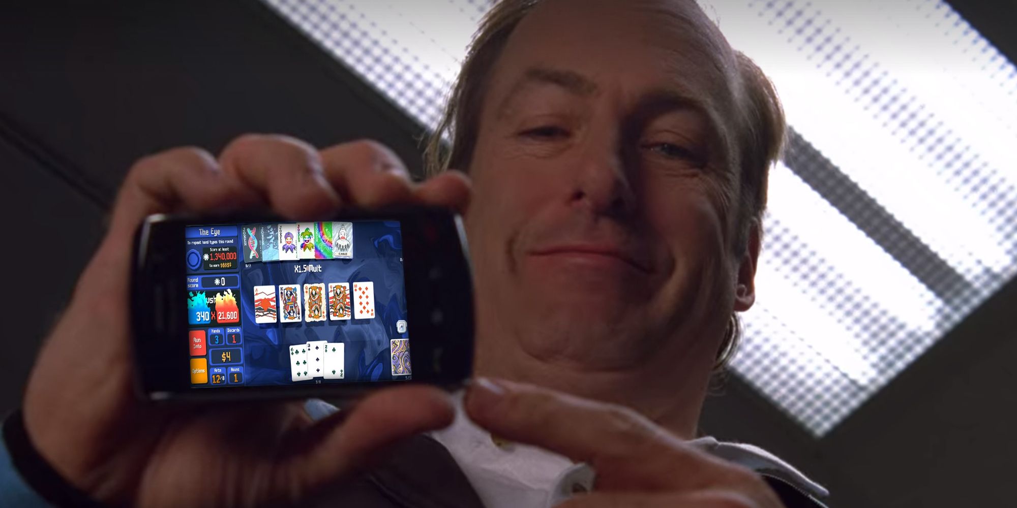 Saul from Breaking Bad showing you Balatro on his phone