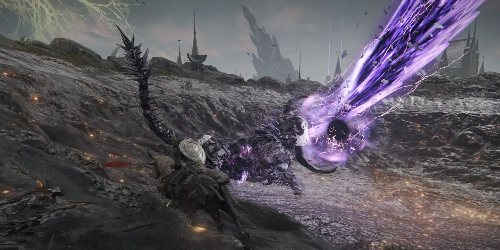 The Fallingstar Beast in Elden Ring Attacking the Tarnished