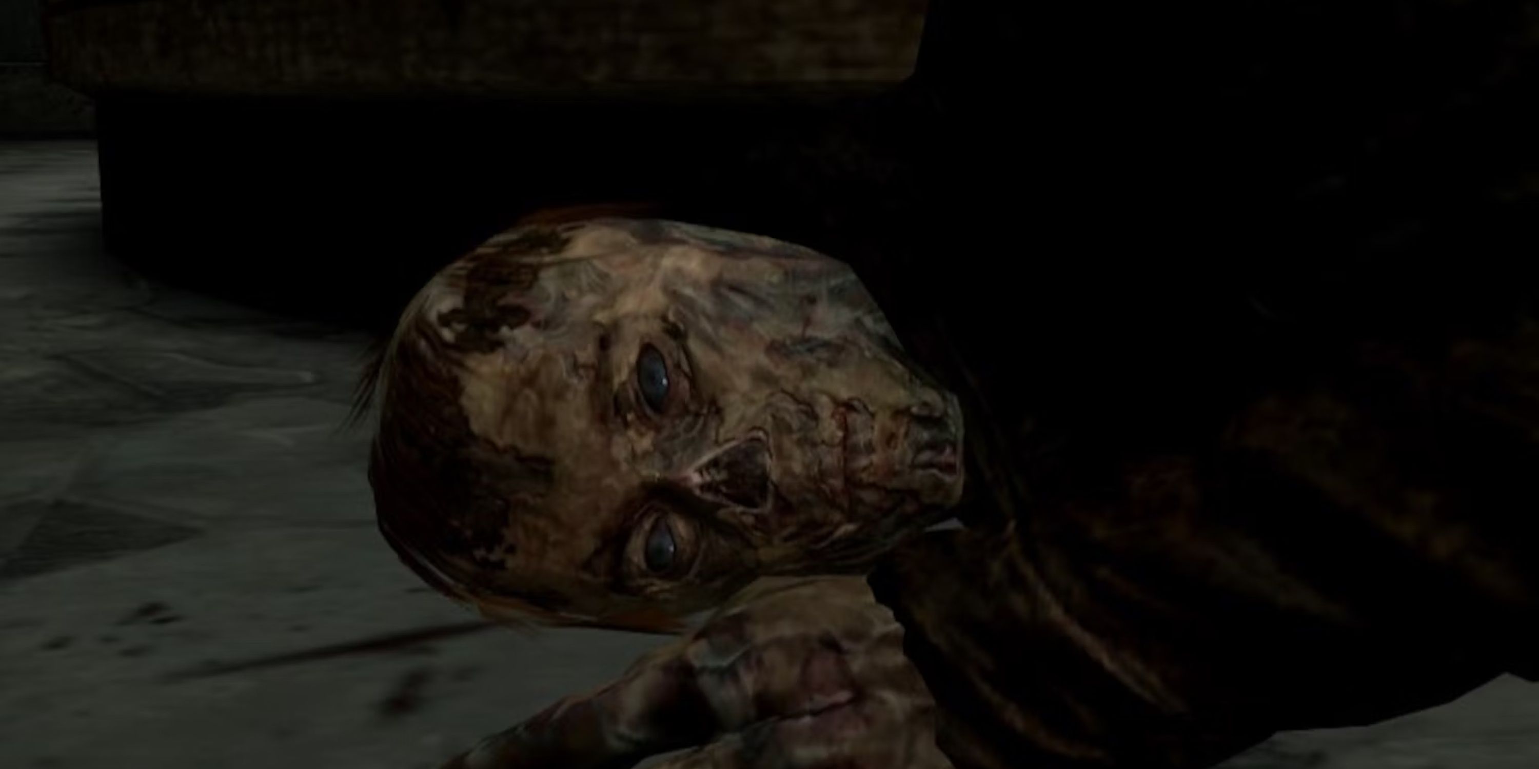 A dead ghoul lies on the ground