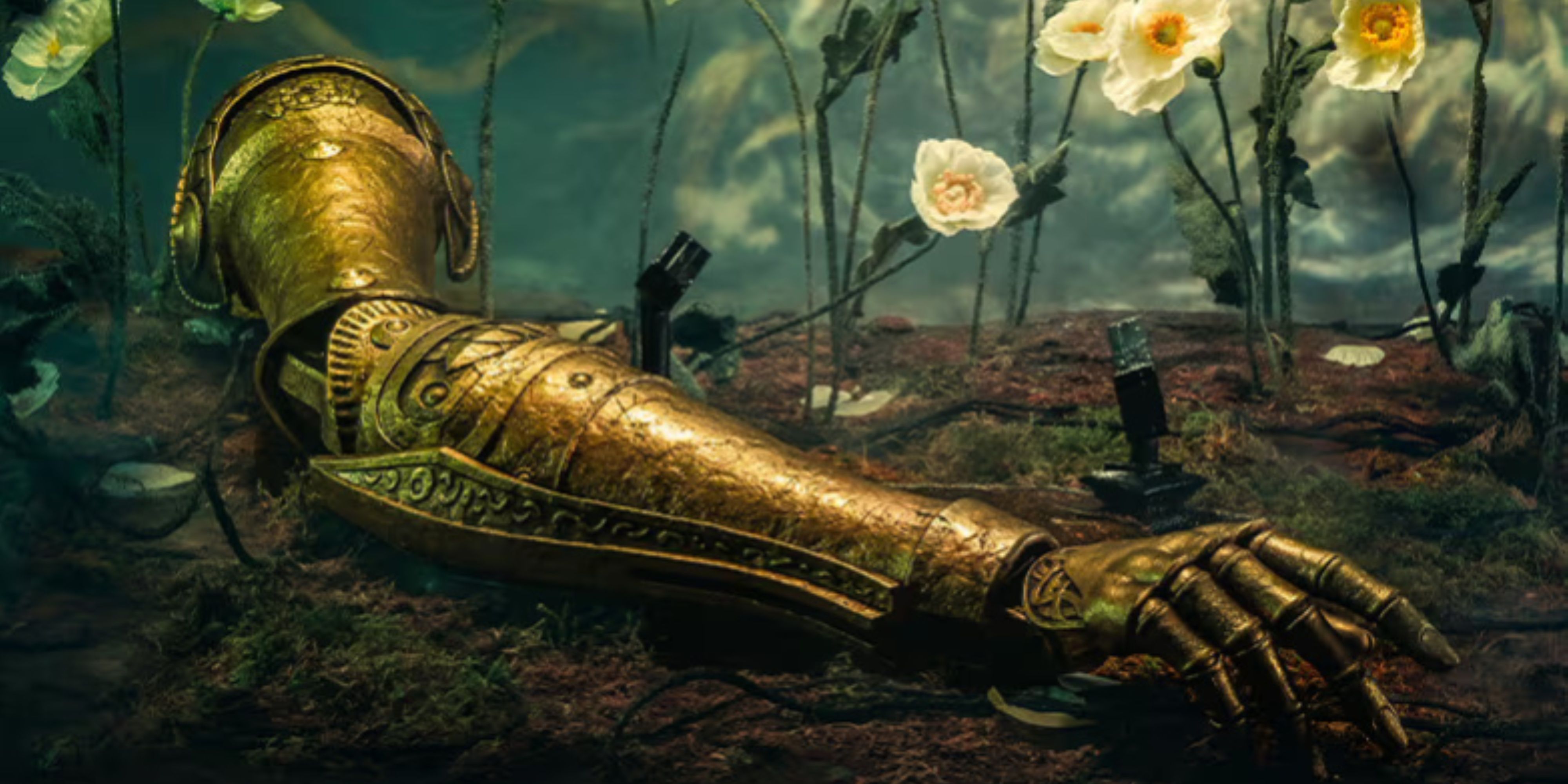 elden ring replica malenia arm in a flowerbed