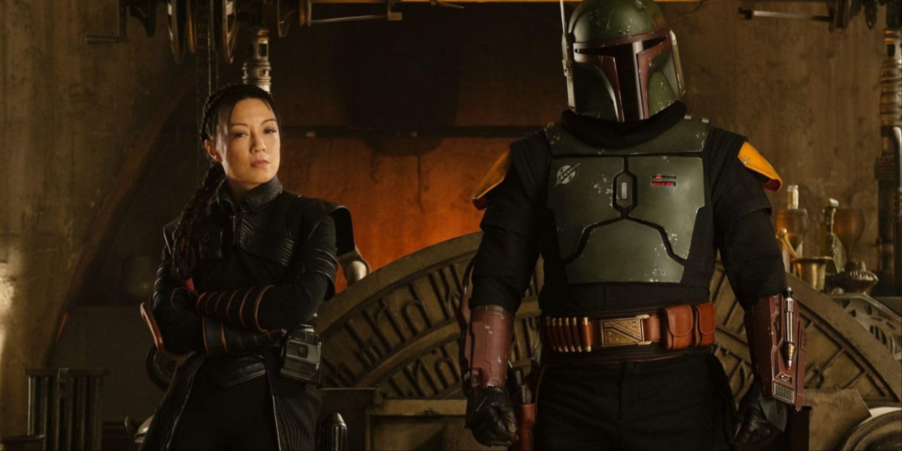 Fennec Shand By Boba Fett's Side As They Stand In Front Of Jabba's Throne in The Book of Boba Fett.