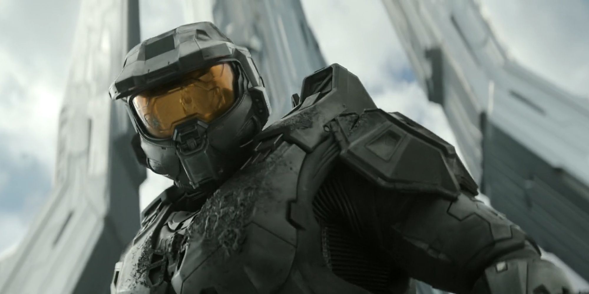 Halo: The TV Show - John Looking Towards The Camera With Forerunner Architecture In The Background