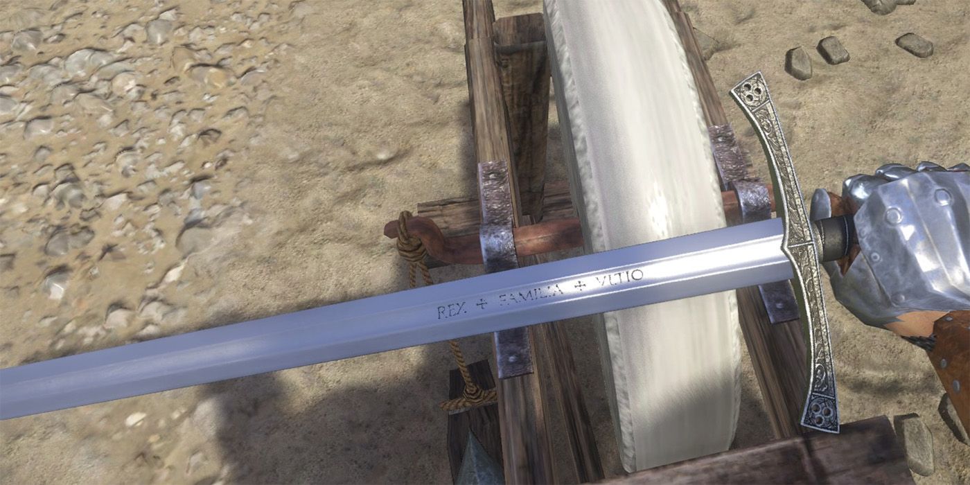 The Magdeburg Sword is silver with Latin inscriptions. The cross guard is slightly upturned.