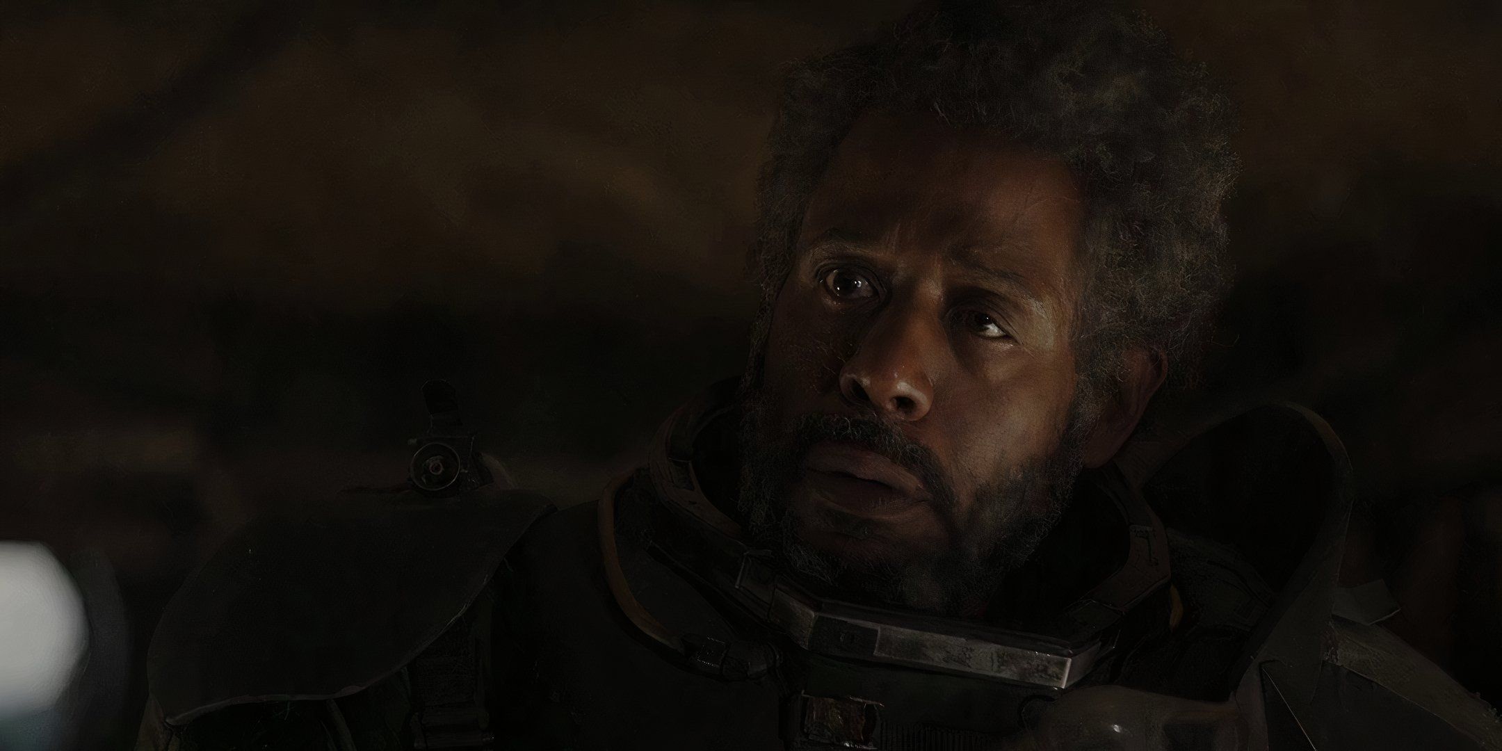 Saw Gerrera with a look of concern in Rogue One