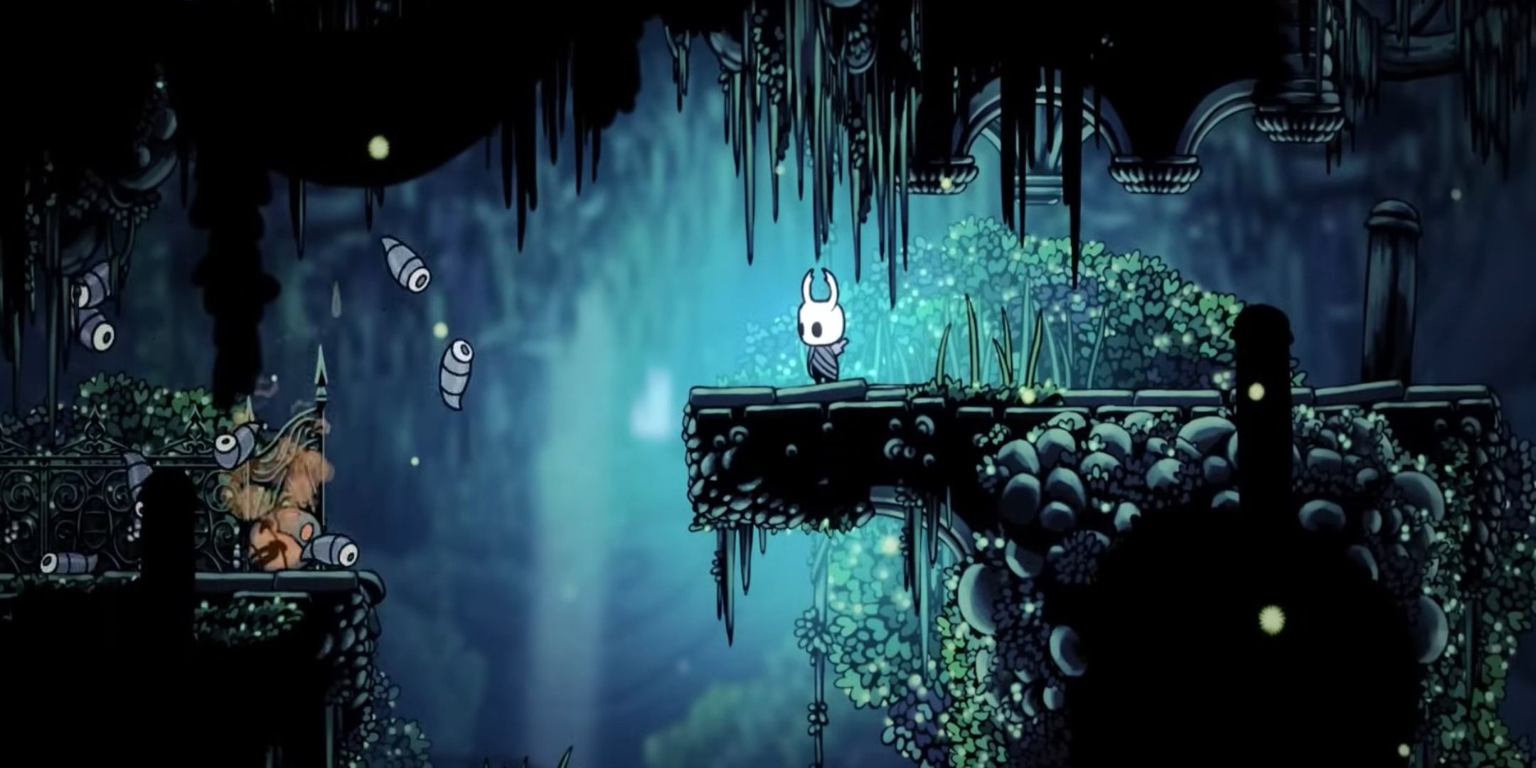 The player standing on a platform in Hollow Knight.