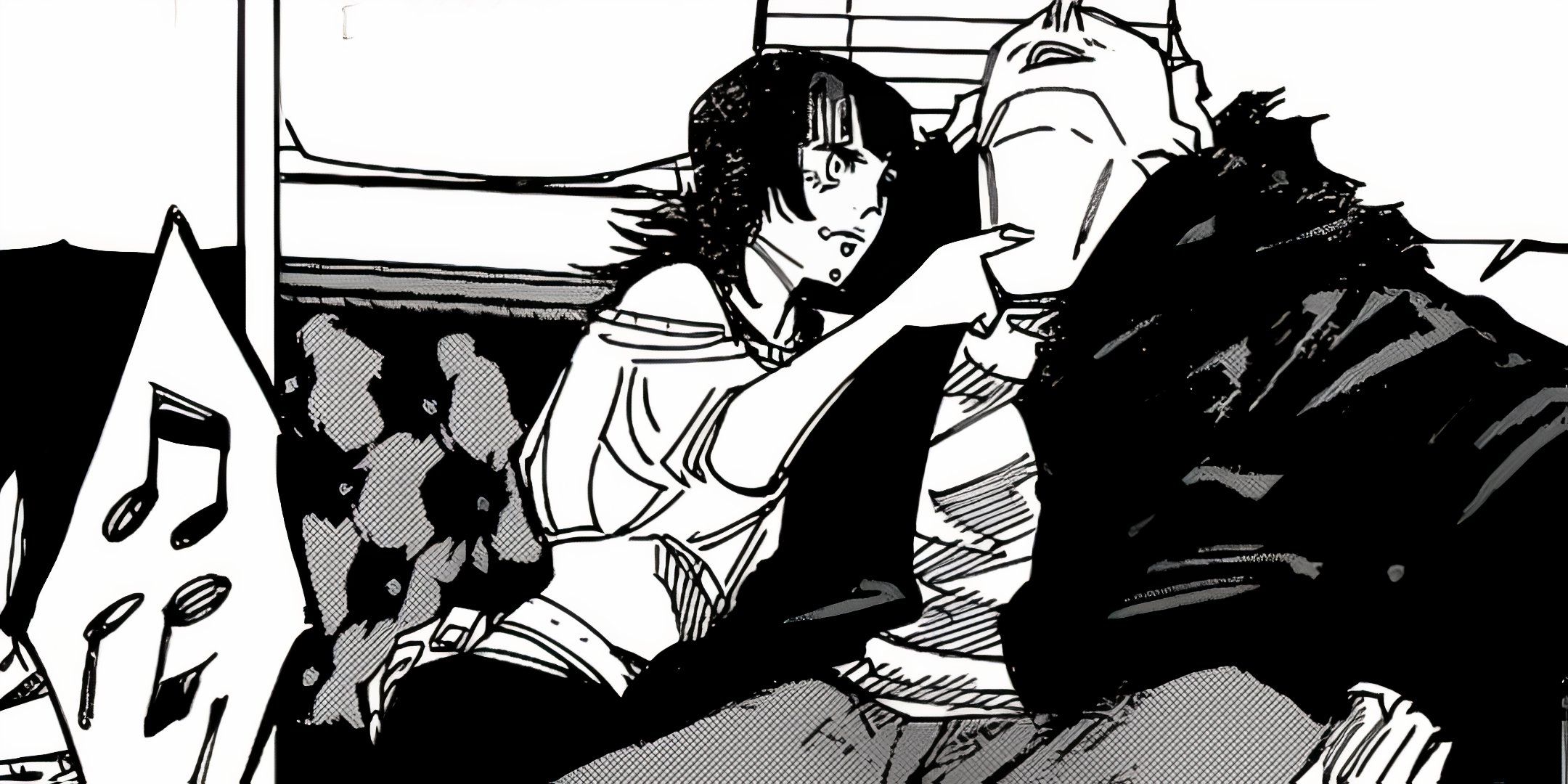 Kiara and Hakari sit on a couch together, Hikari's arm around her.