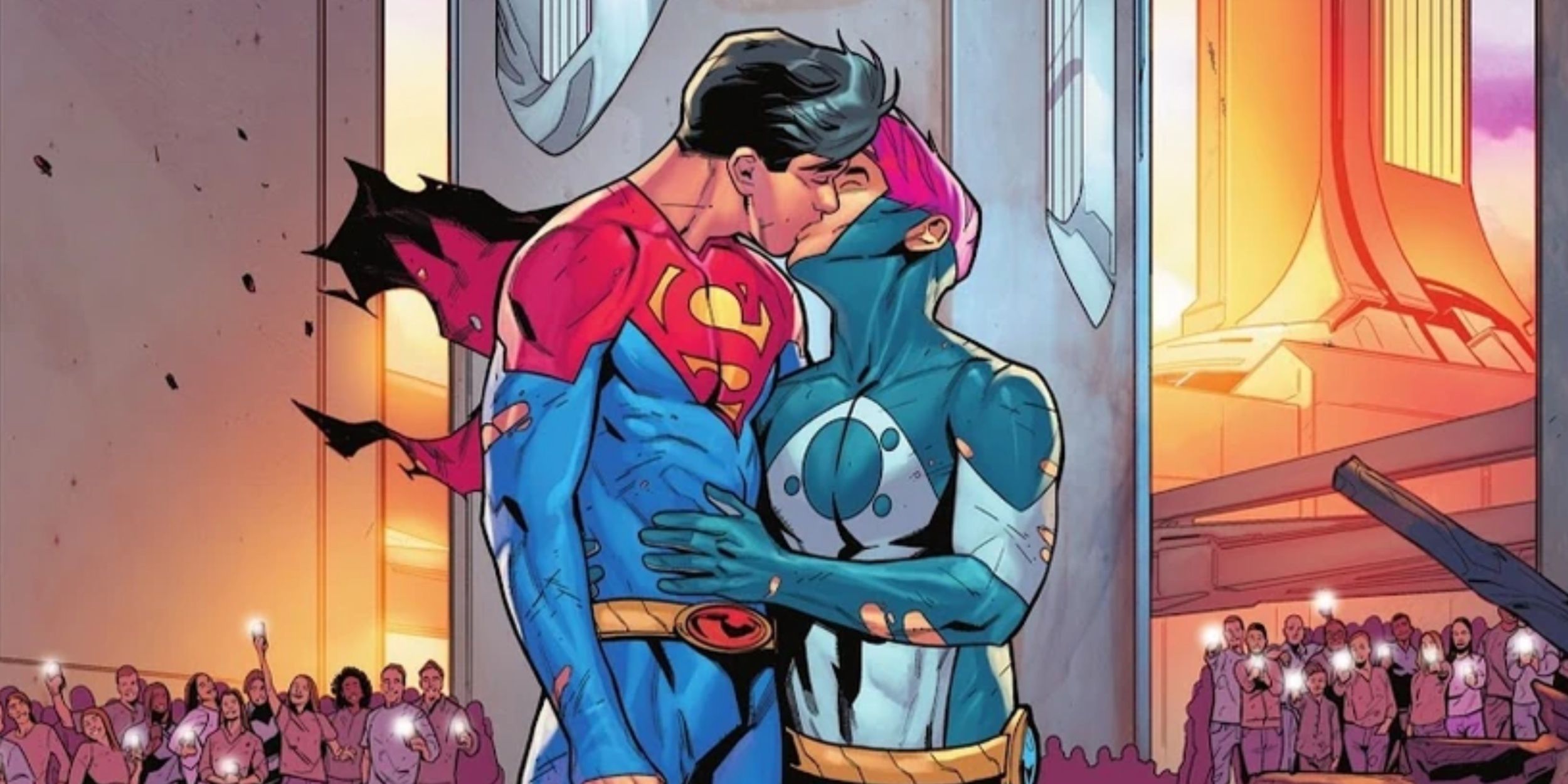 A panel from DC Comics. Jonathan Kent as Superman kisses his boyfriend, Jay Nakamura, with a crowd taking photos on their phones.