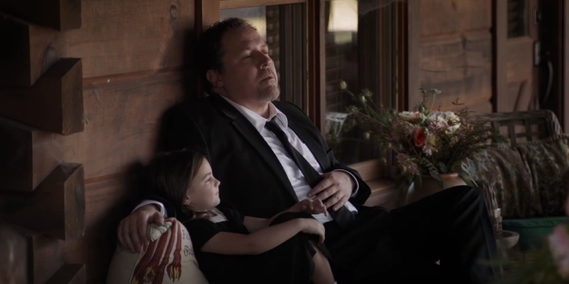 Avengers: Endgame scene showing Happy Hogan sitting in a bench with a child.
