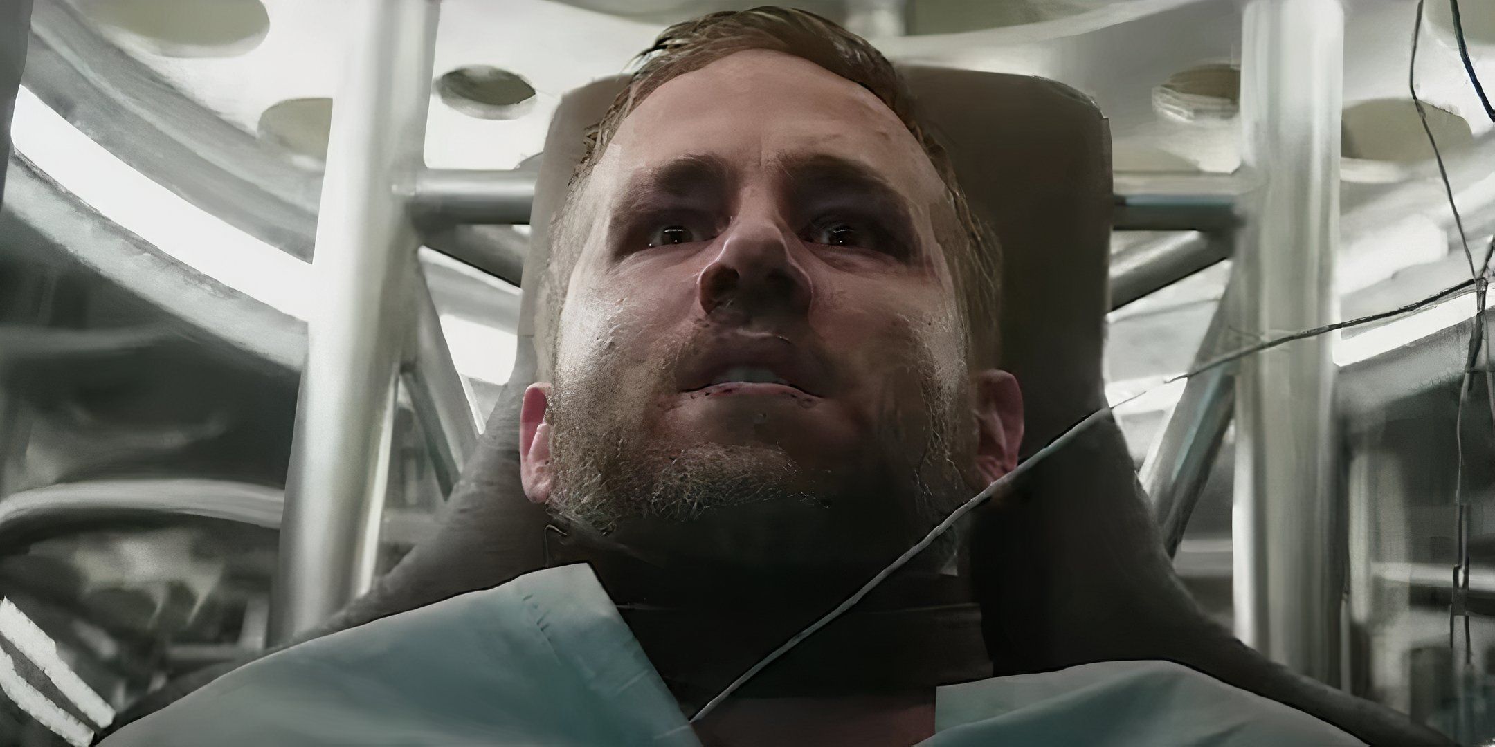 Deadpool movie image showing Wade Wilson straped to a machine meant to give him powers.