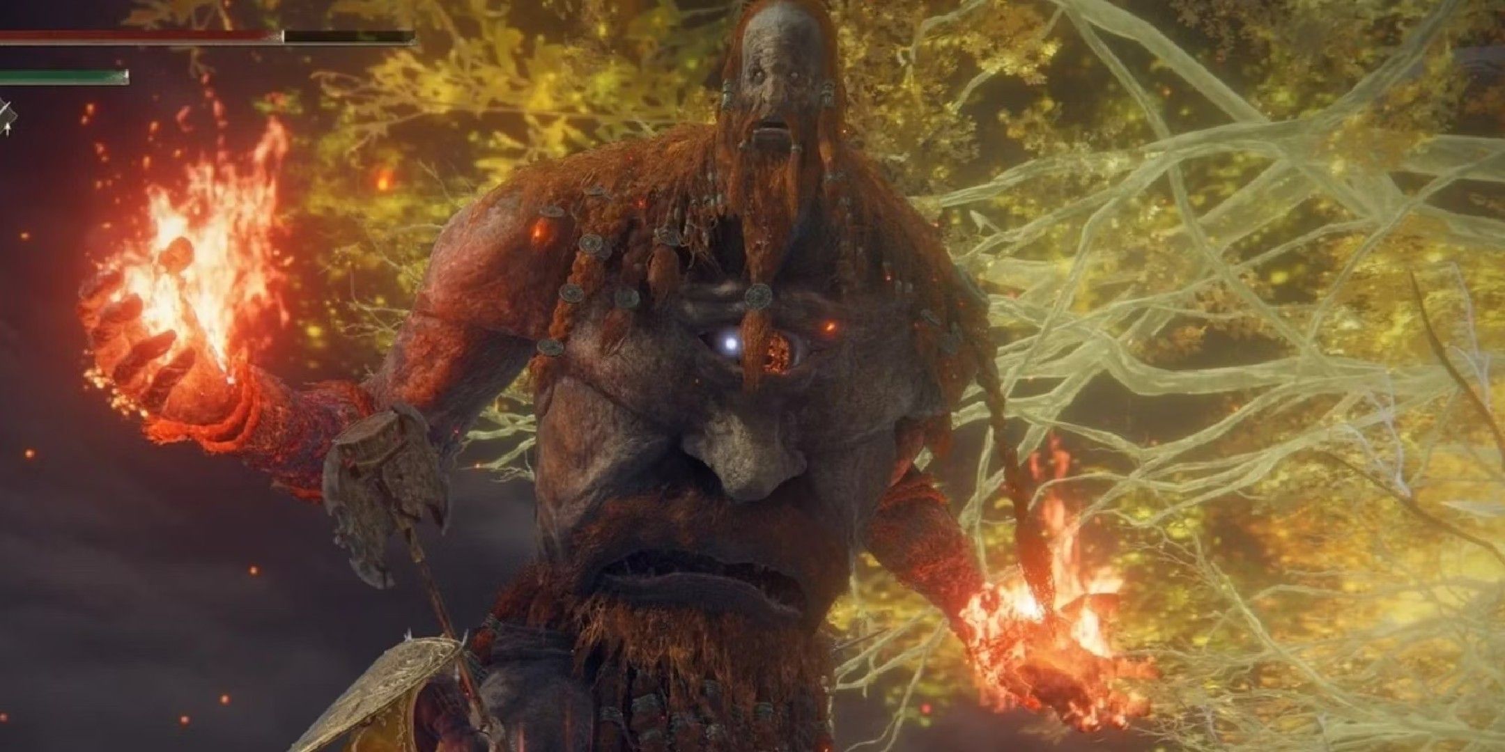 Elden Ring image showing the Fire Giant about to attack the player.