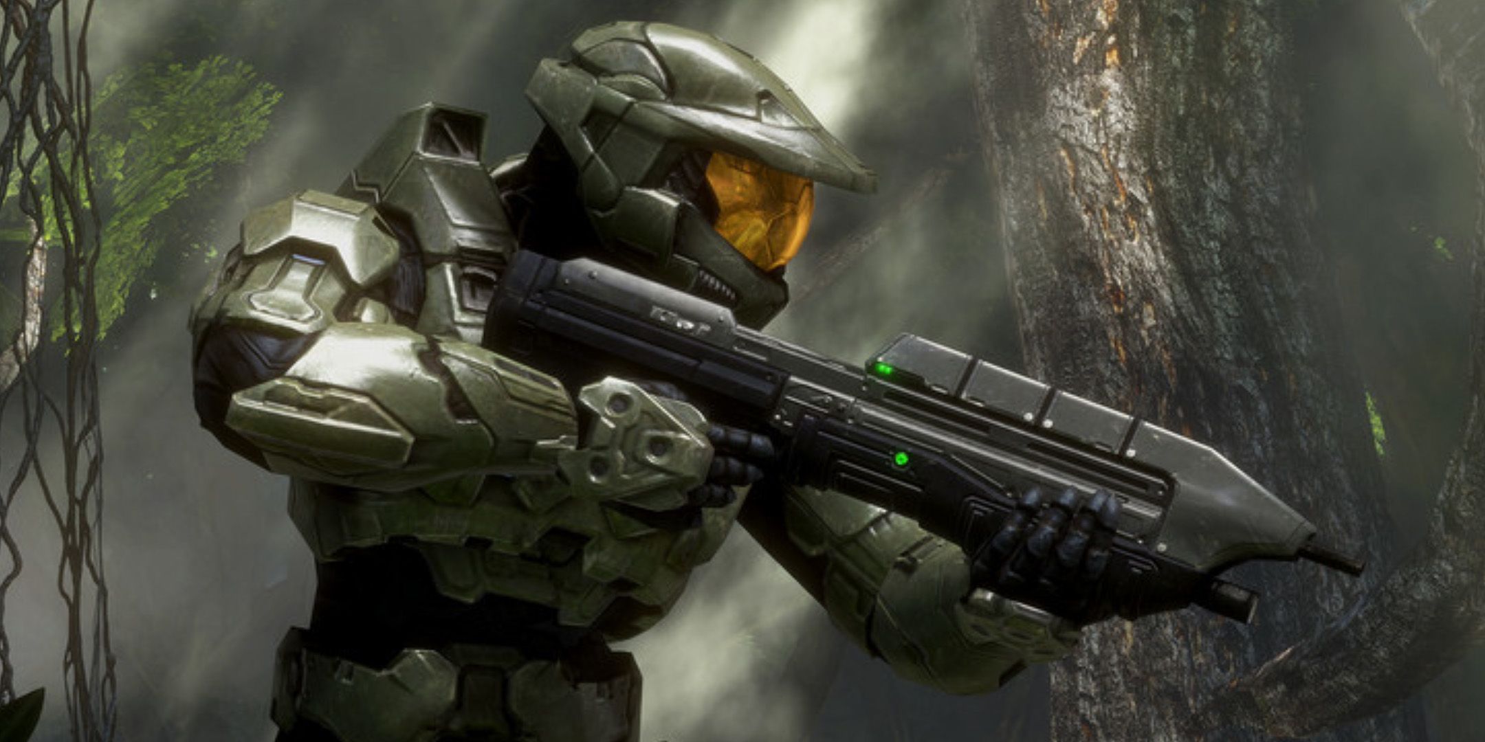 Master Chief holding a gun while exploring a dark swamp in Halo.